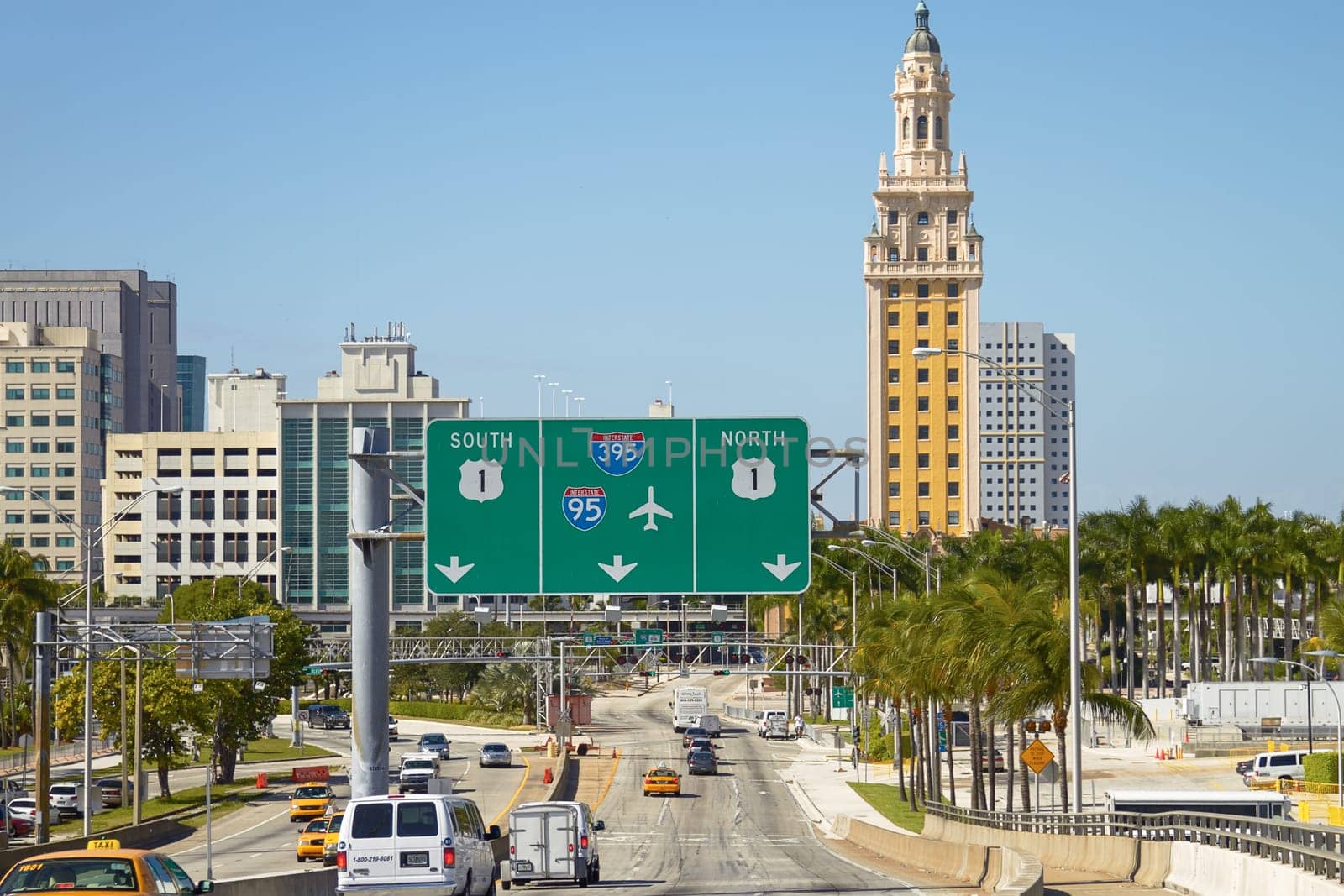 MIAMI, FLORIDA, USA - NOVEMBER 13, 2010: Traffic at The Freedom tower and Miami Downtown from Port Boulevard.