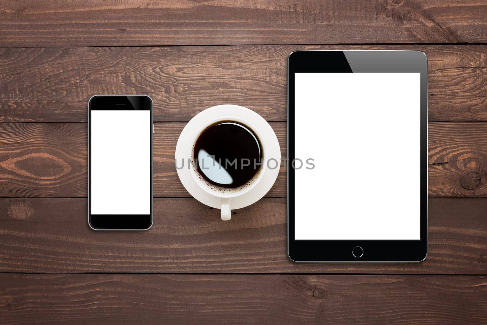 phone tablet and coffee cup on wood table top view