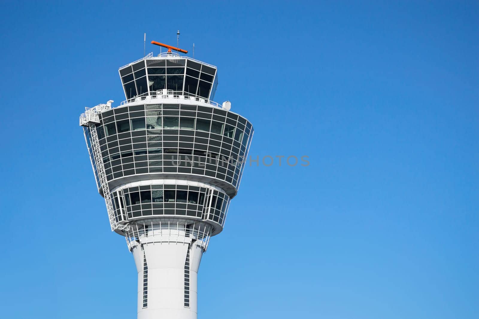 Munich air traffic control tower in airport with clear blue sky and free copy-space place for your text