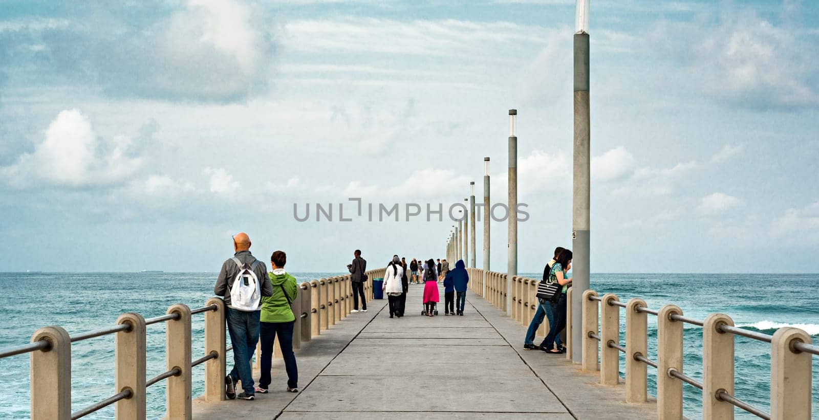 DURBAN, SOUTH AFRICA - AUGUST 17, 2015: People on the pier at North Beach Durban