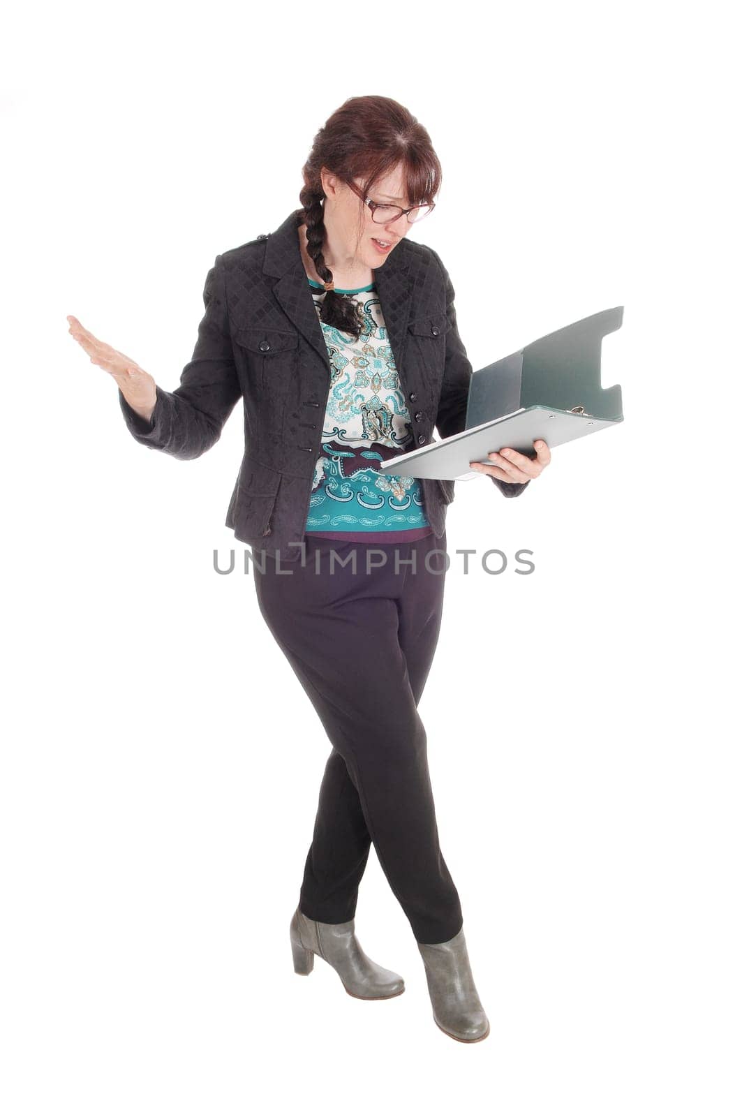 A Caucasian business woman standing with her clipboard in her hand .wondering what has happened, isolate for white background..