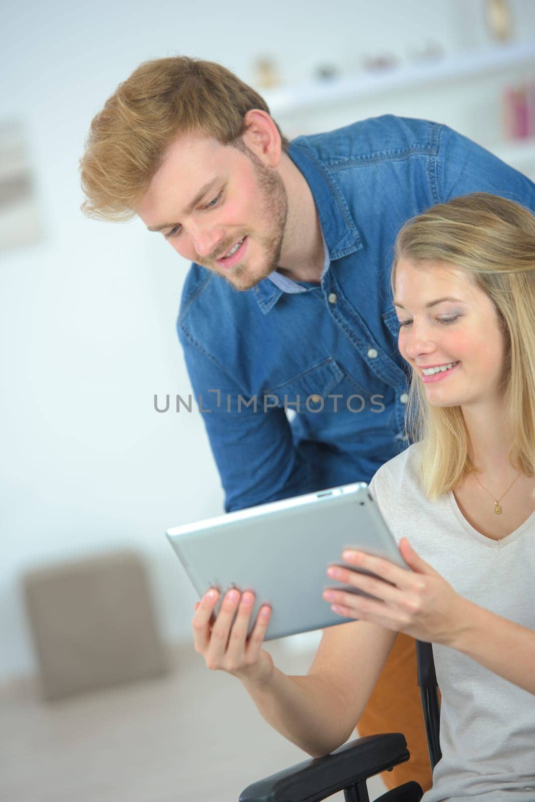 Couple using a tablet computer
