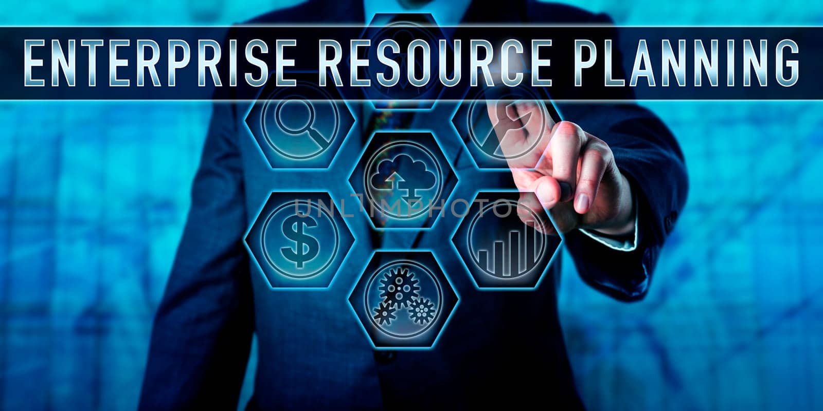 Male corporate manager is touching ENTERPRISE RESOURCE PLANNING on an interactive virtual control monitor. Business management metaphor and information technology concept for ERP. Business term.
