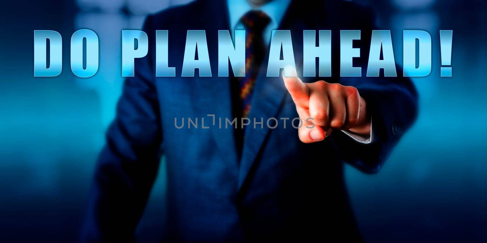 Management consultant is pushing DO PLAN AHEAD! on a virtual touch screen display. Call to action, motivational metaphor and business concept for anticipation of future challenges.