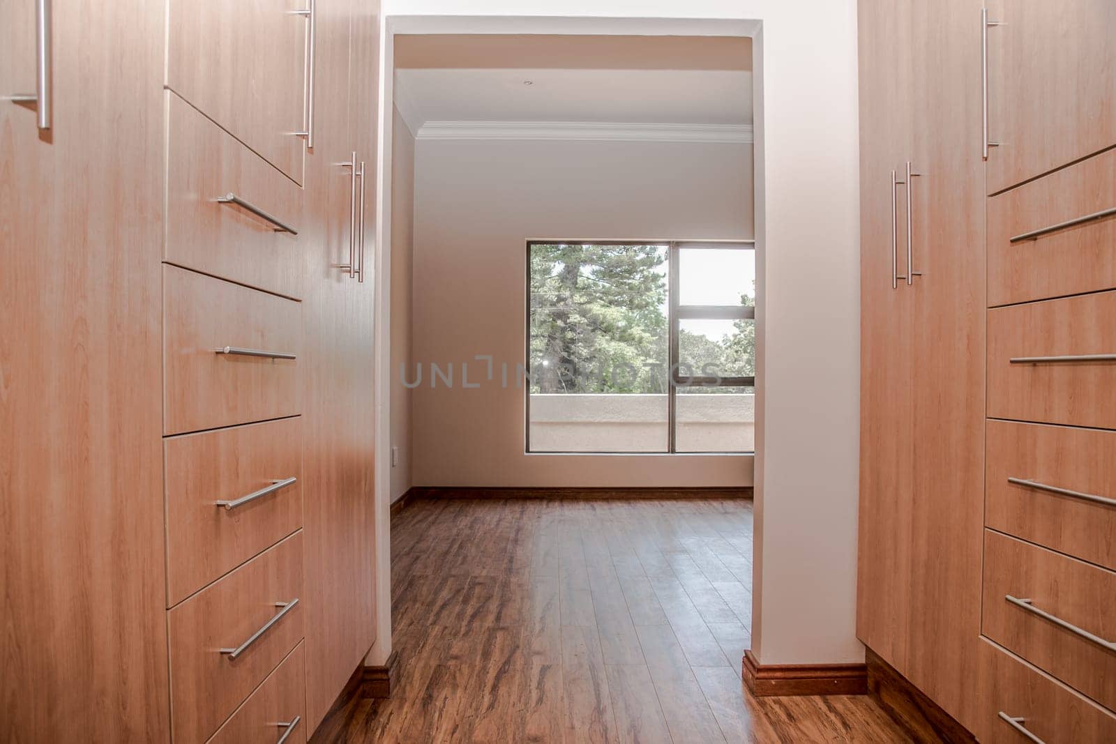 The dressing area of a newly build house that is up for sale.