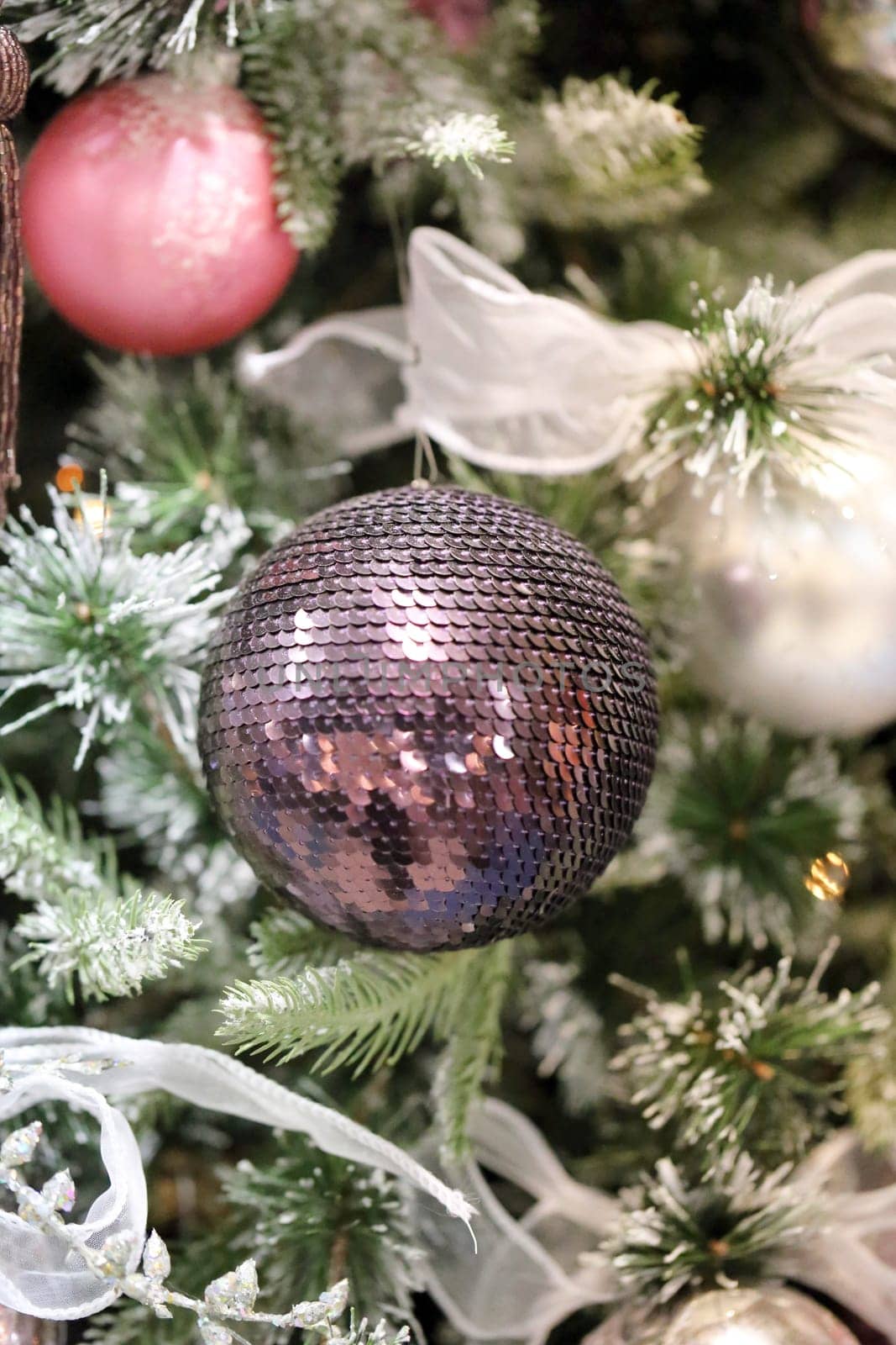 Christmas tree with beautiful toys photographed closeup