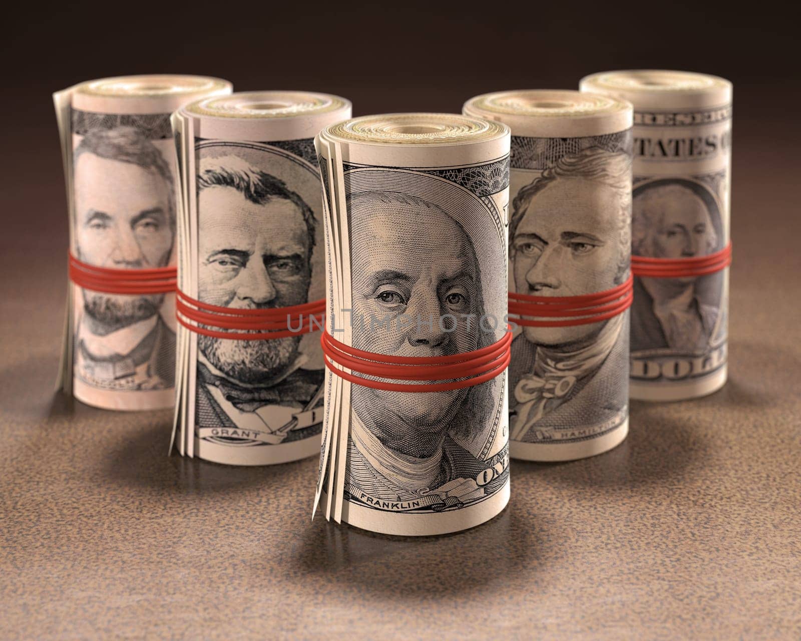 Money rolls with elastic gagging the mouths of the symbols of United States currency.