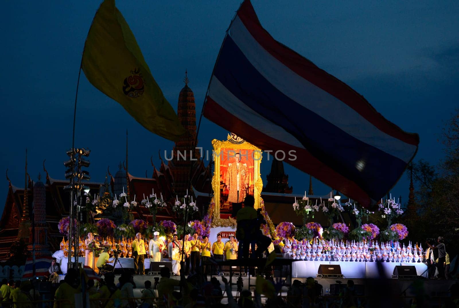 Tousends of Thai People at the ceremony of the coronation Day of the King Bhumibol on the Sanam Square Park on the 5. May in the city of Bangkok in Tahiland, Southeastasia.