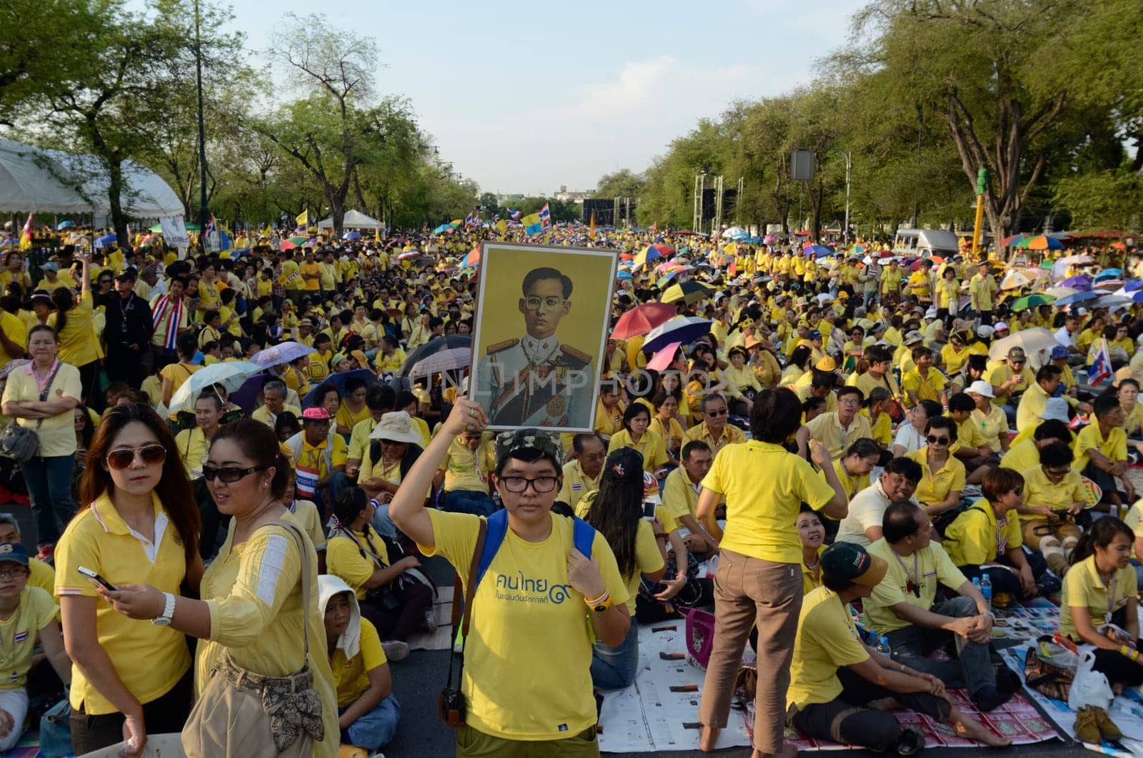 Tousends of Thai People at the ceremony of the coronation Day of the King Bhumibol on the Sanam Square Park on the 5. May in the city of Bangkok in Tahiland, Southeastasia.