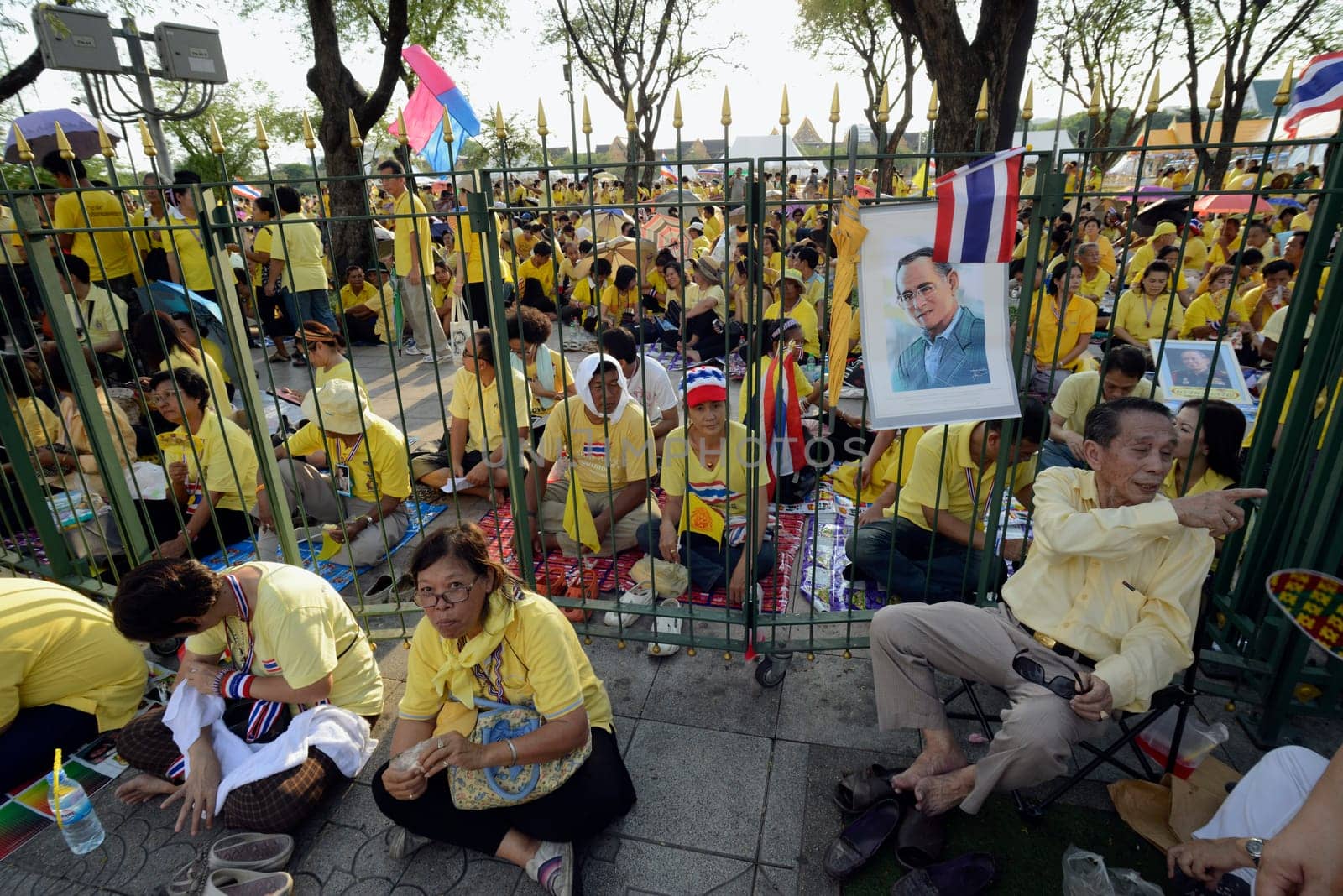 Tousends of Thai People at the ceremony of the coronation Day of the King Bhumibol on the Sanam Square Park on the 5. May in the city of Bangkok in Tahiland, Southeastasia.