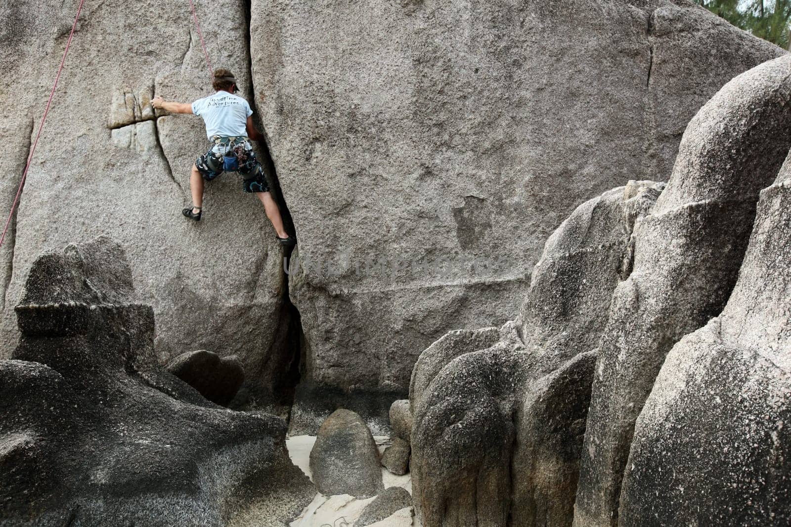 climbing at the Beach at Hat Sai Ri on thel Ko Tao Island in the Gulf of Thailand in the southeast of Thailand in Southeastasia.