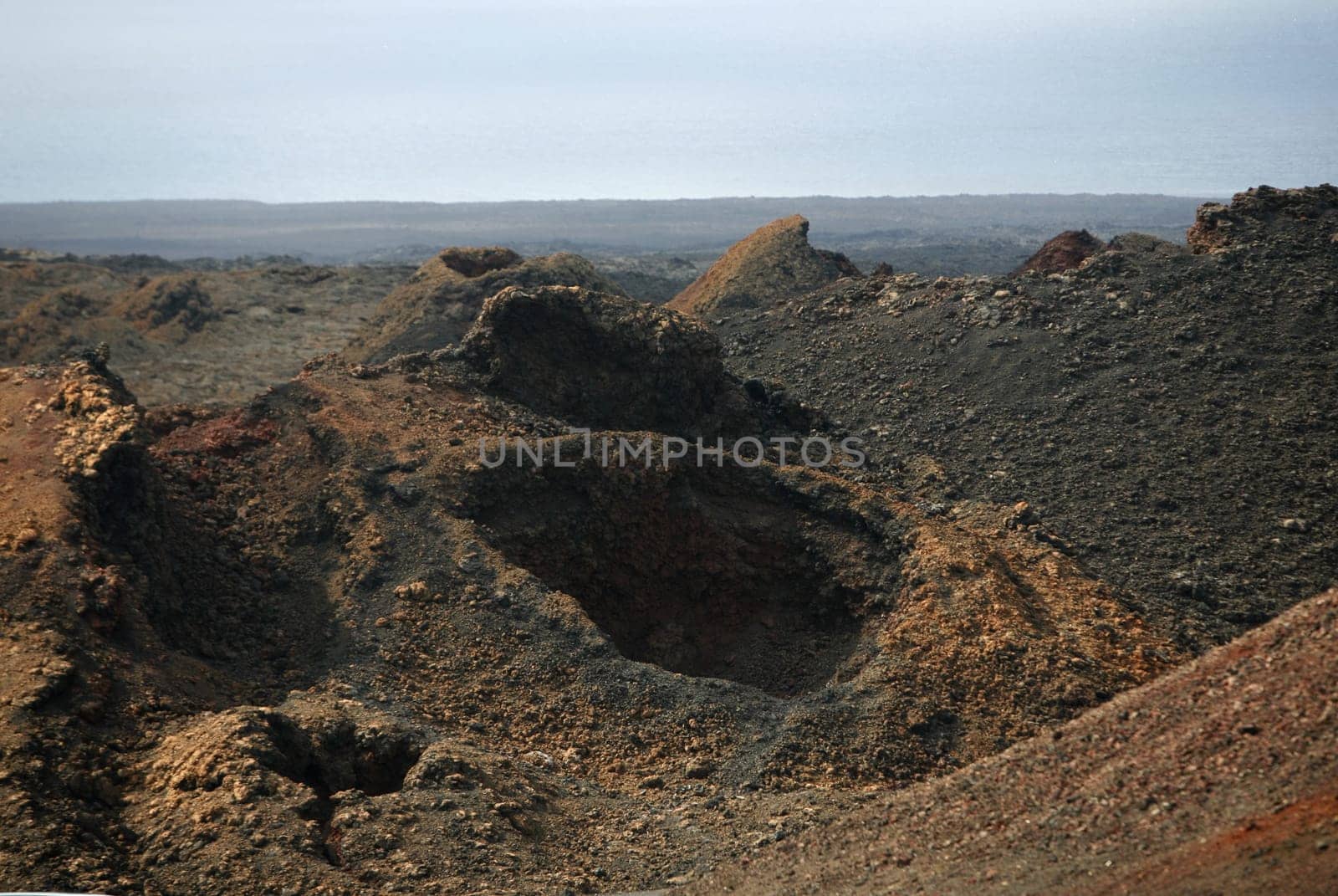 The Vulkan National Park Timanfaya on the Island of Lanzarote on the Canary Islands of Spain in the Atlantic Ocean. on the Island of Lanzarote on the Canary Islands of Spain in the Atlantic Ocean..