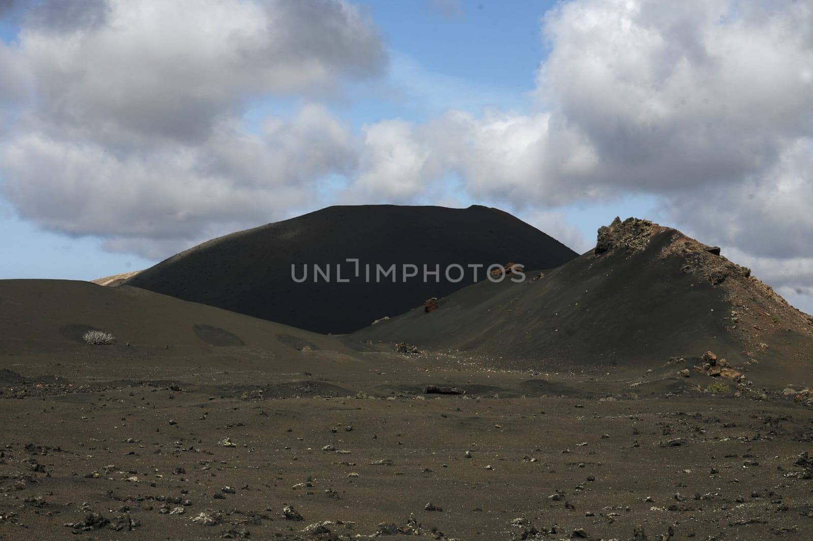 The Vulkan National Park Timanfaya on the Island of Lanzarote on the Canary Islands of Spain in the Atlantic Ocean. on the Island of Lanzarote on the Canary Islands of Spain in the Atlantic Ocean..