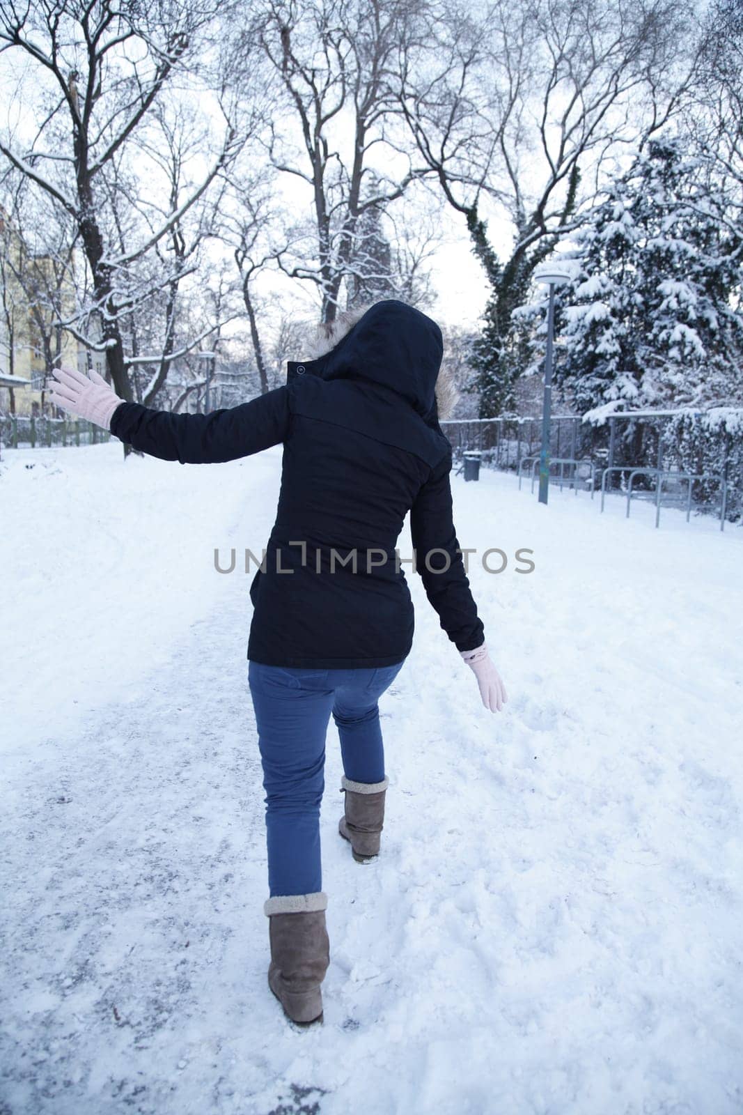 woman slipping on snow