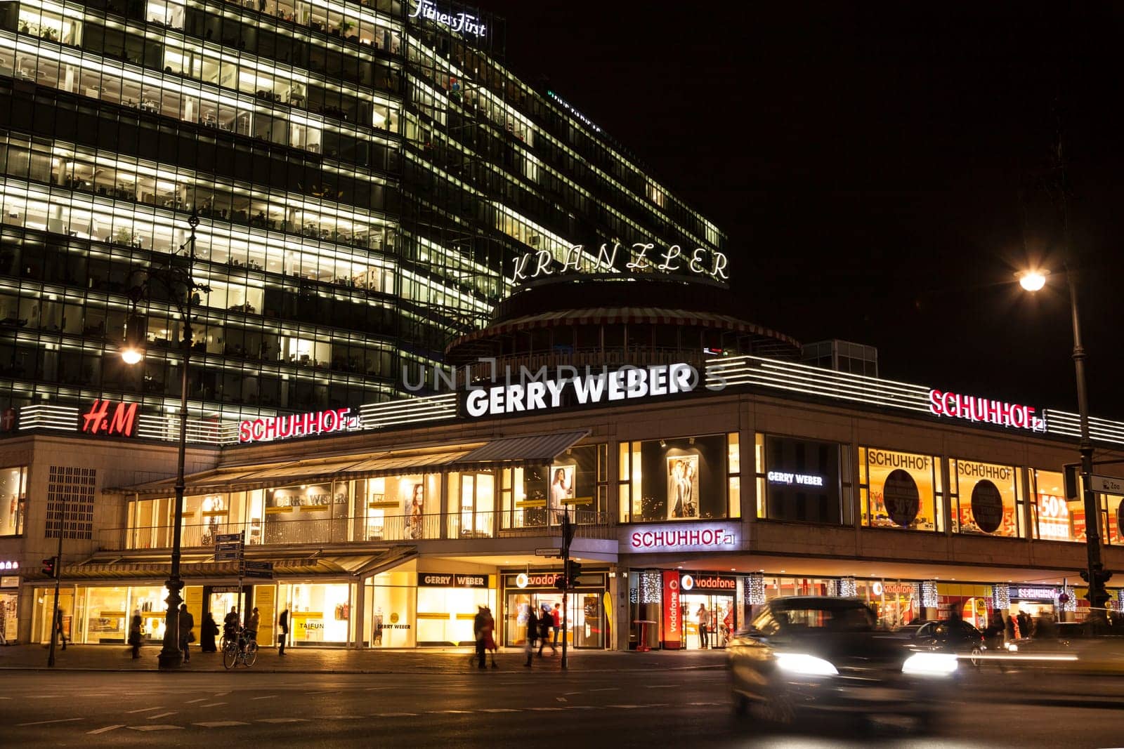 Kurfuerstendamm Joachimsthaler street in Berlin in evening