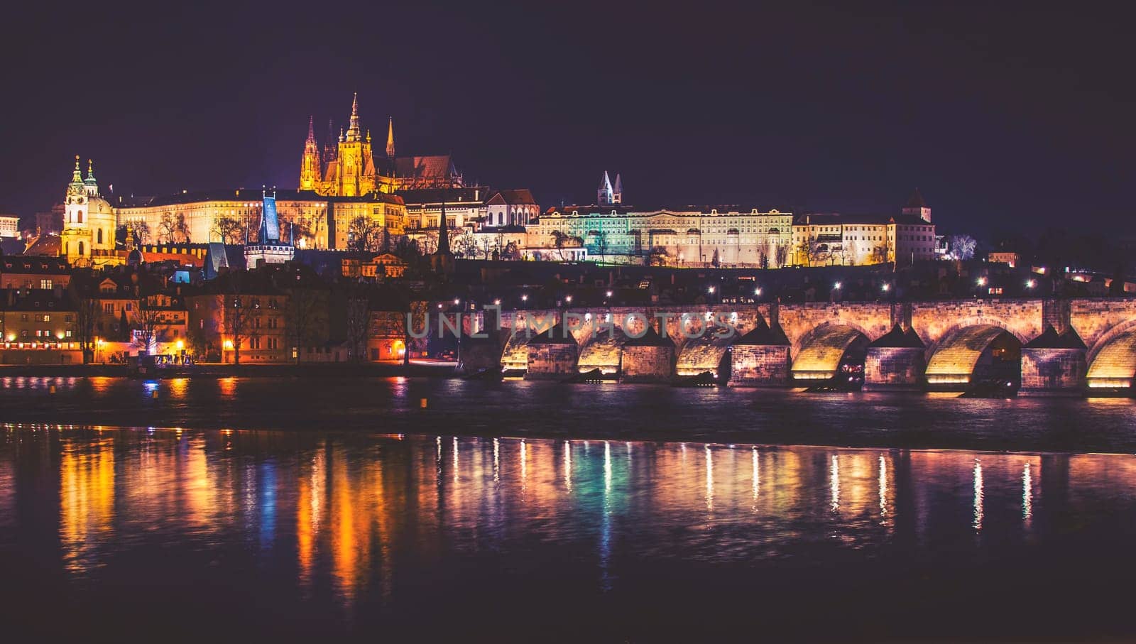 castle,charles bridge and vltava river,night panorama of prague,czech republic,vintage effect