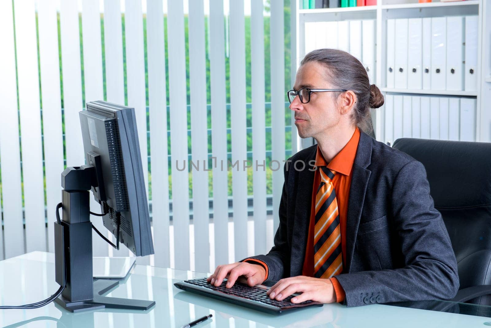 young business man at his desk working