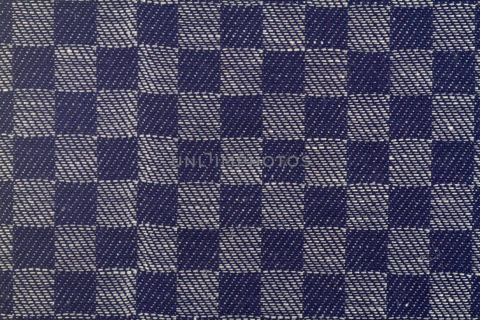 Checkered kitchen towel in detail as background