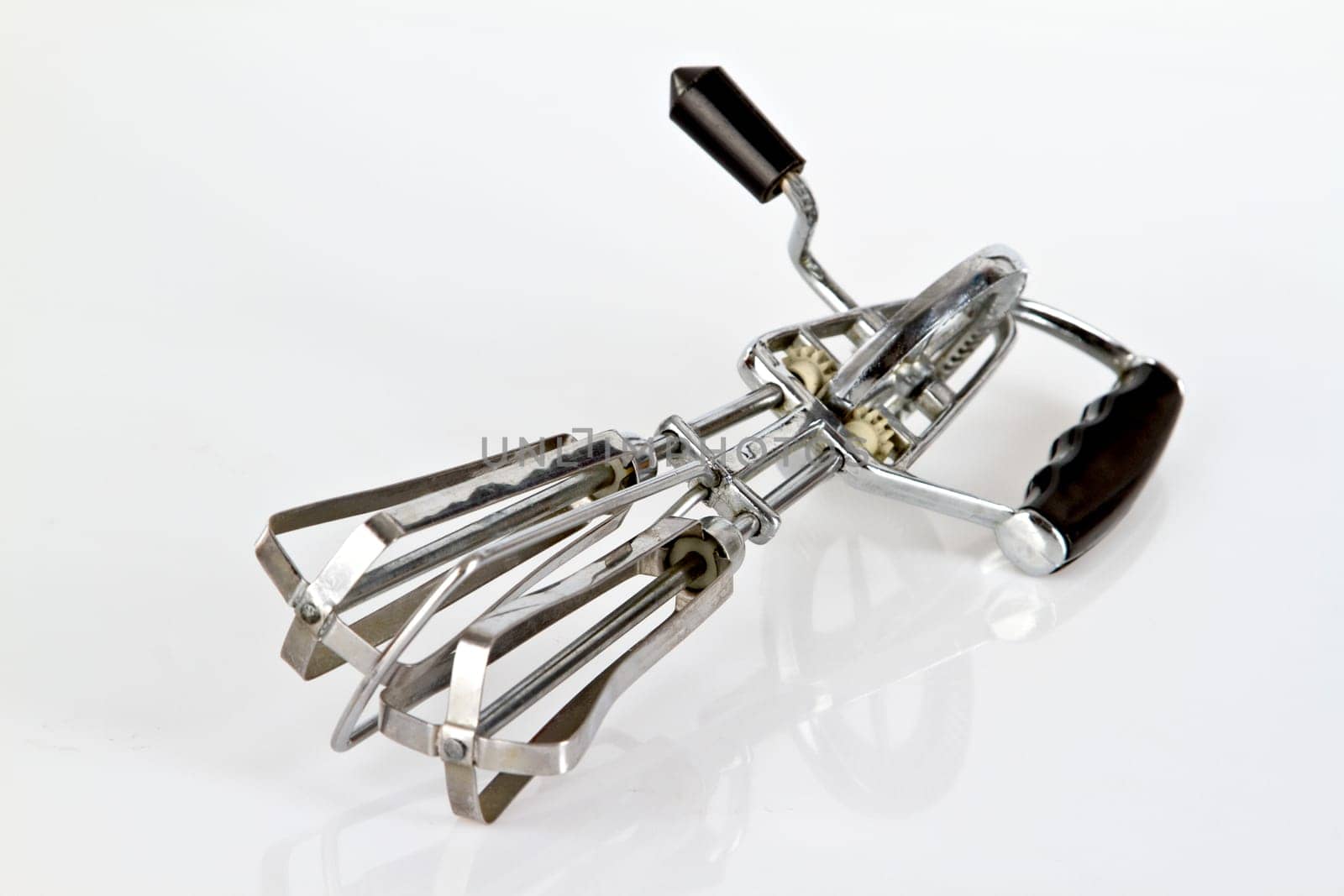 Kuechenquirl - hand-operated kitchen appliance on a bright background