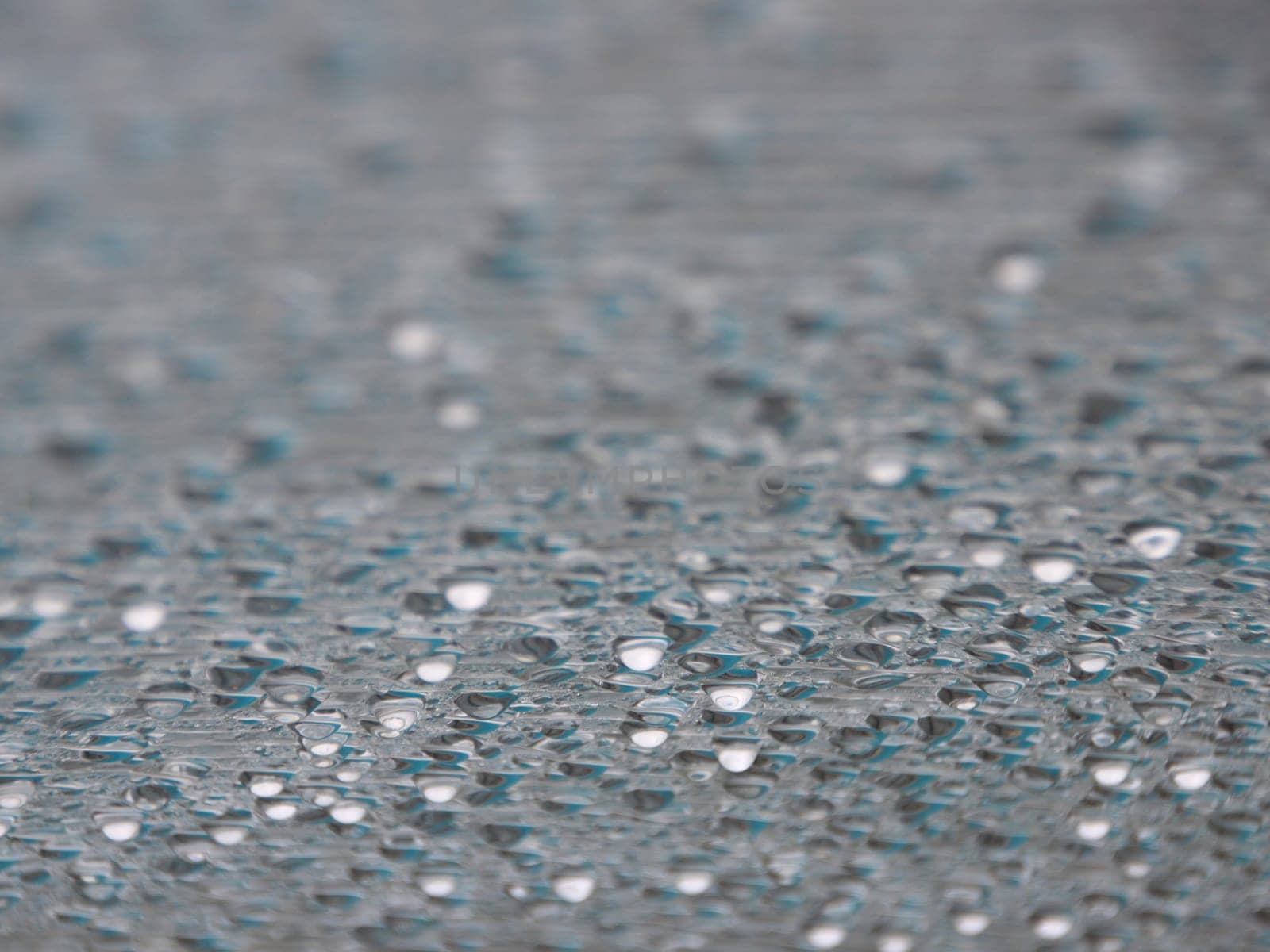 Water Damp Moisture Condensation under Striped Plastic Roof in a Small Outdoor Swimming Pool. Cold outside - but Warm Inside.