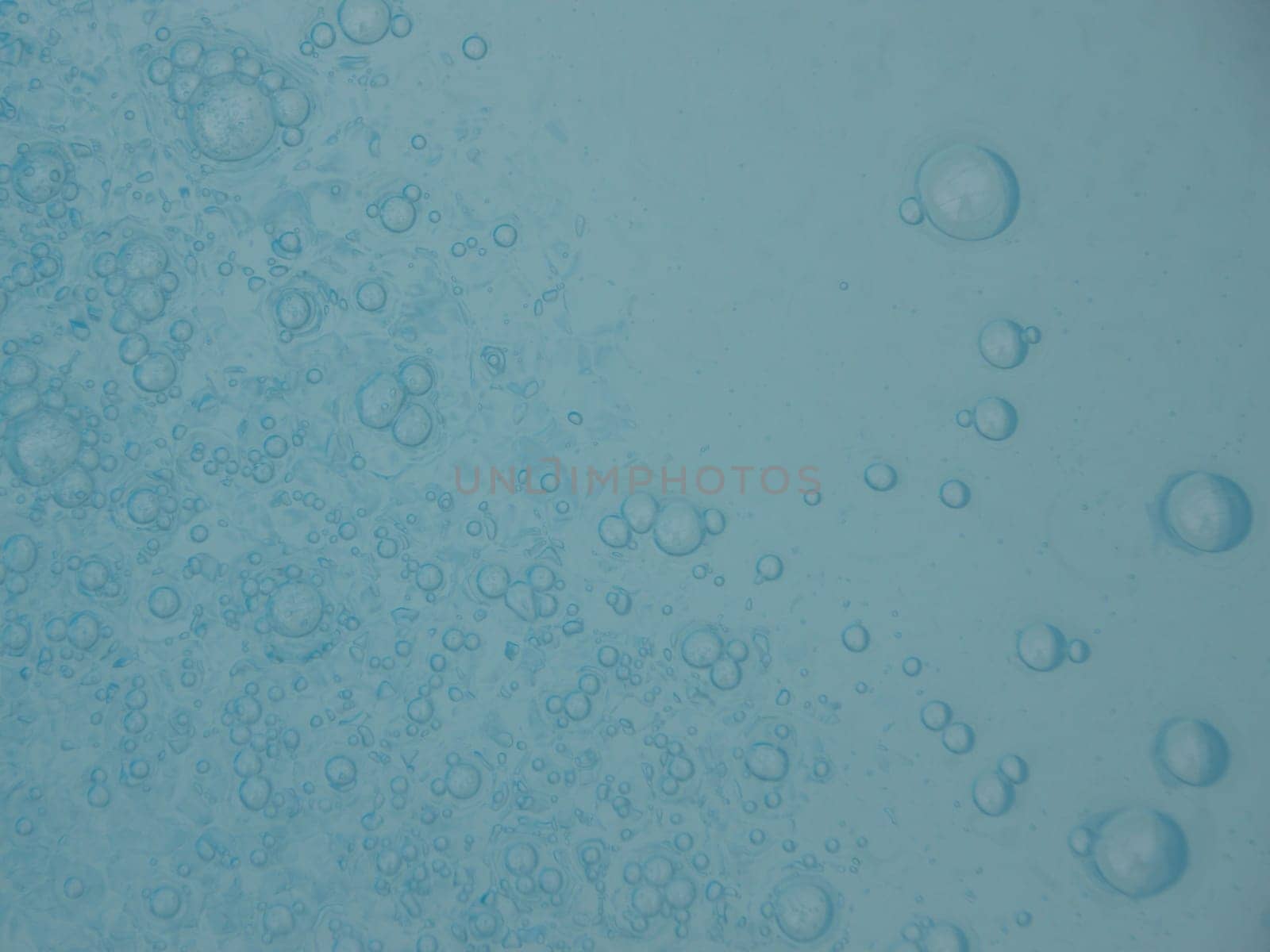 Deep Light Blue Swimming Pool Water with One Large Bubble Background Abstract Pattern