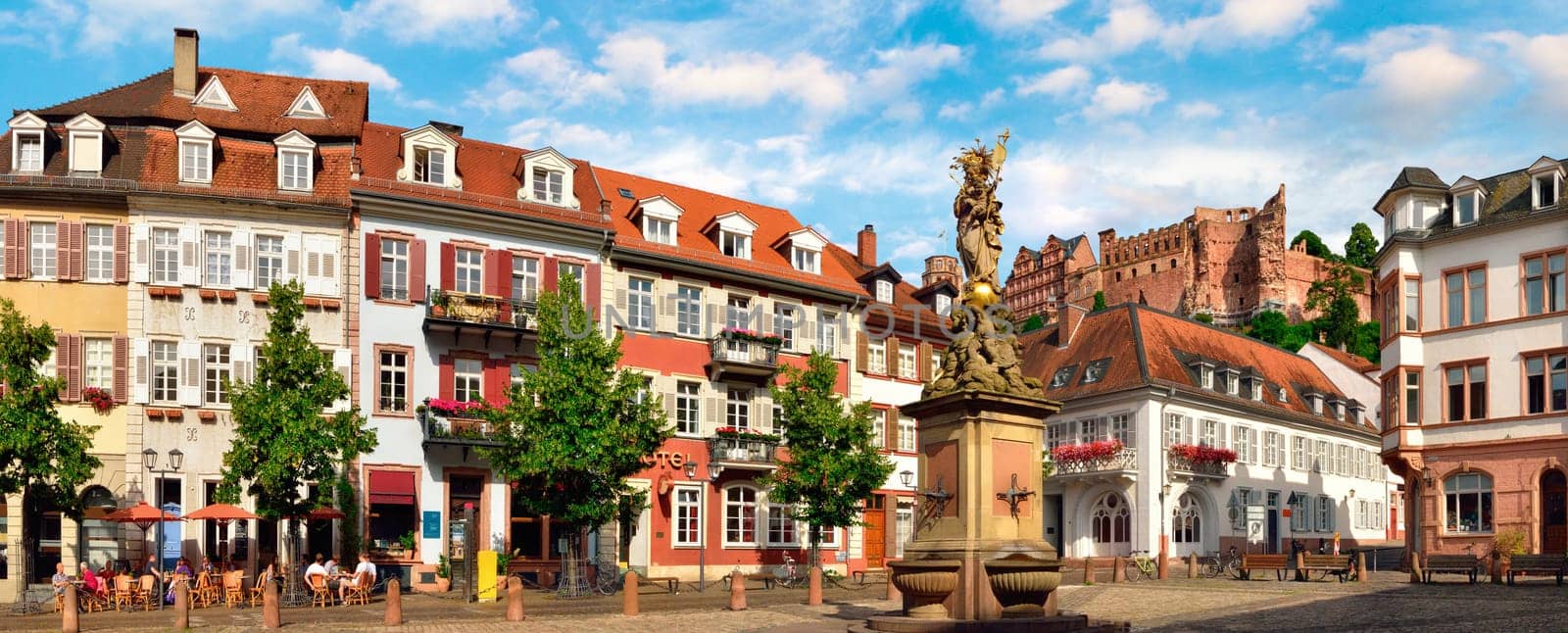 The Kornmarkt Square in Heidelberg,Germany,daytime panorama,faces are blurred out