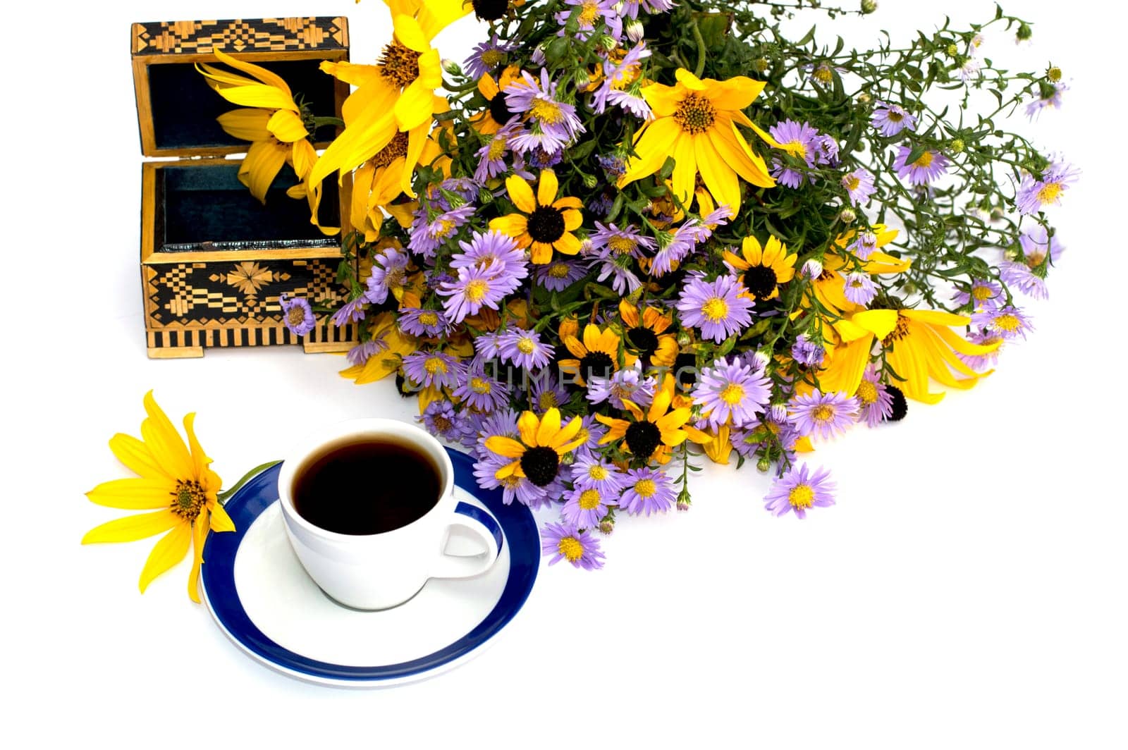 still life beautiful casket, coffee and bouquet of flowers, isolate, subject seasons spring and summer, drinks and flowers