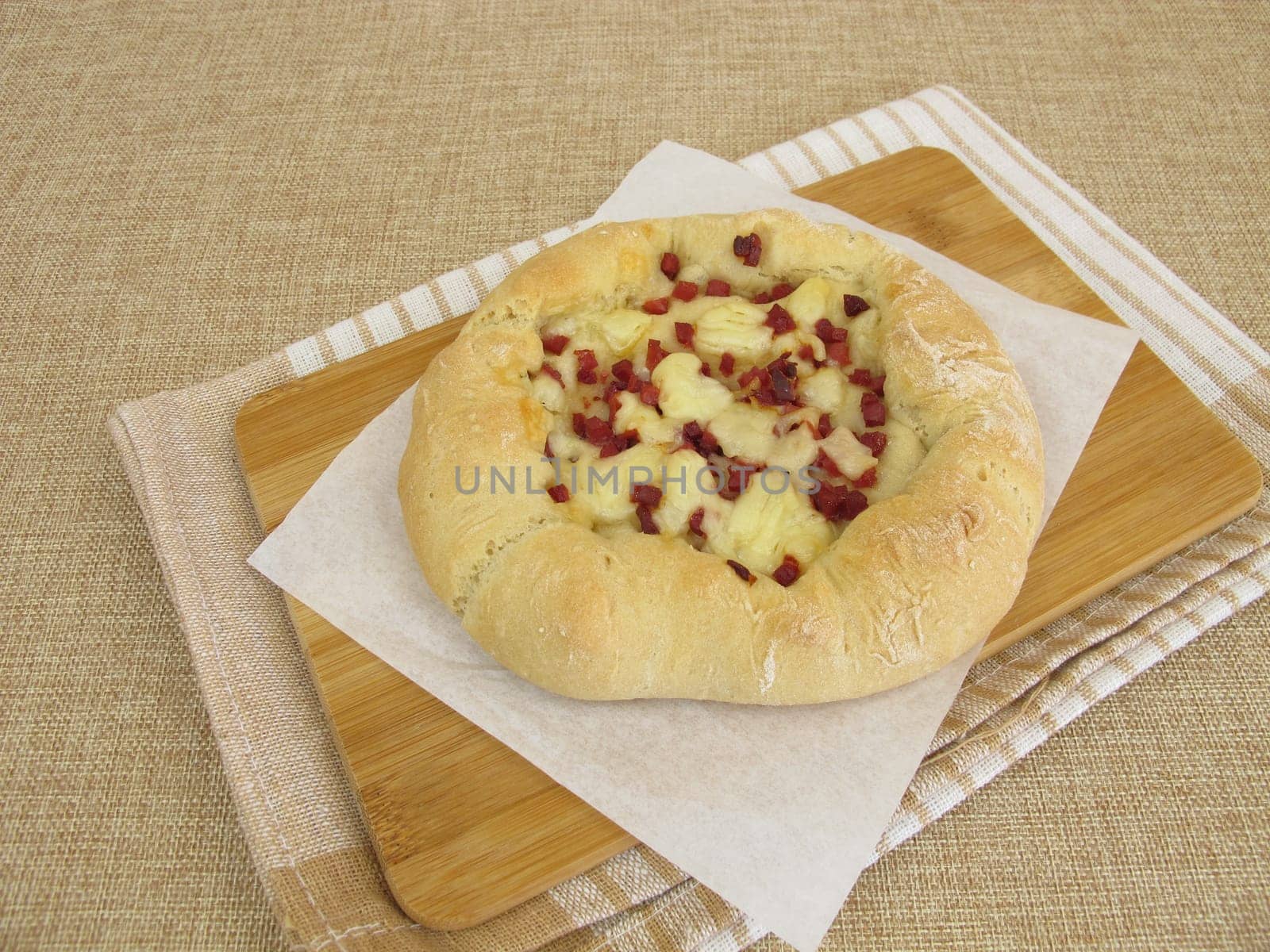 Pizza bread street food with cheese and ham