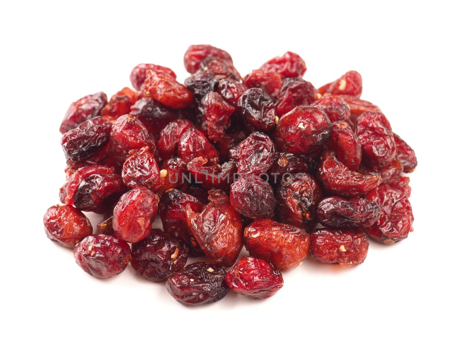 Dried cranberries on a whitebackground, healthy food concept