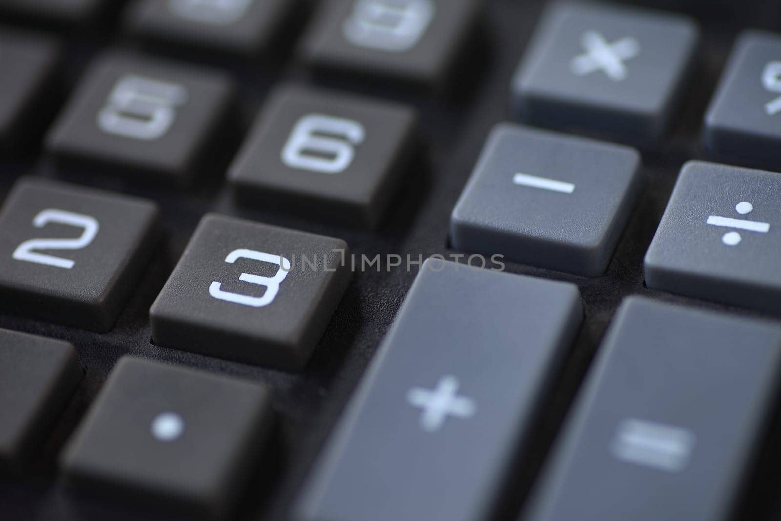 Numbers and symbols on a desk calculator
