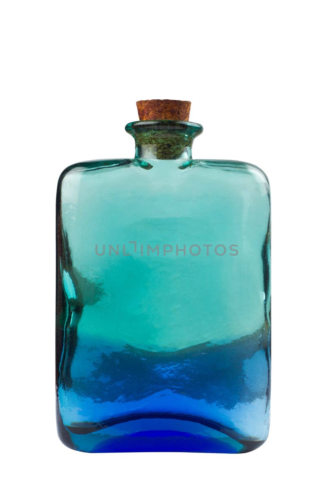 Small blue transparent glass bottle with cork isolated on white