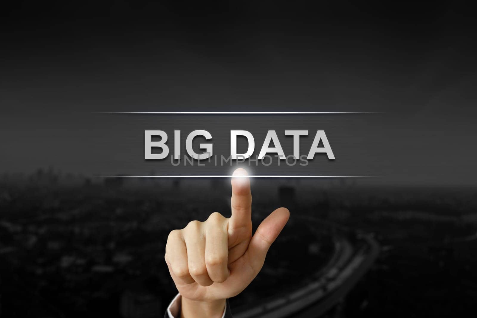business hand clicking big data button on black blurred background