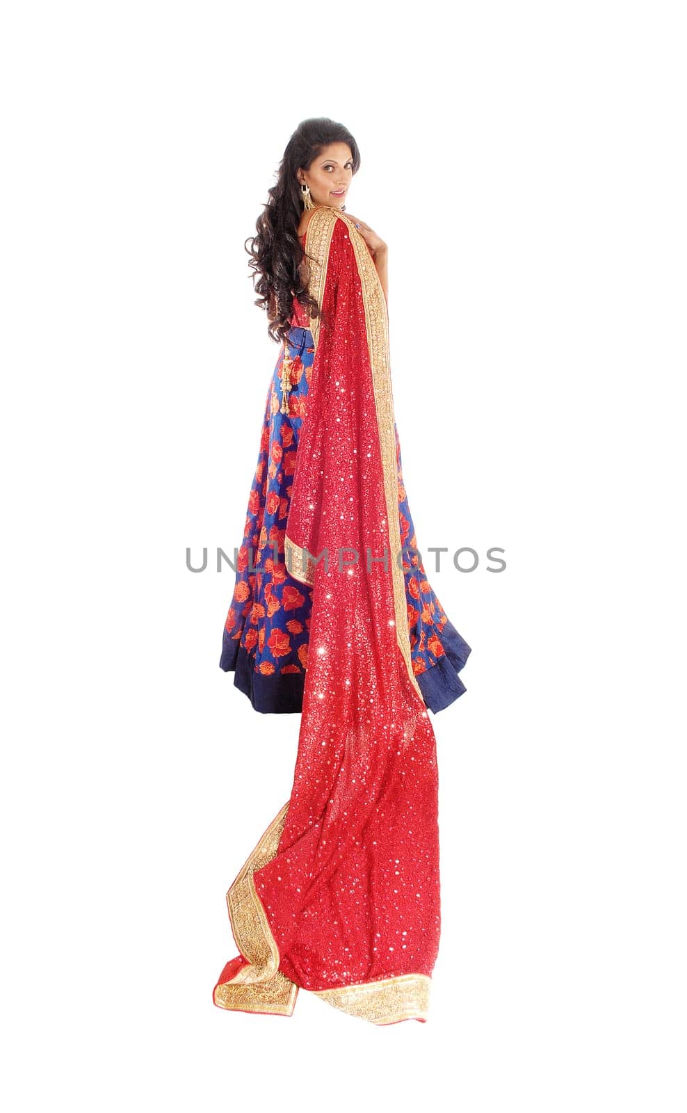 A lovely woman standing in a blue dress and long black hair holding.a long red vail, isolated for white background..