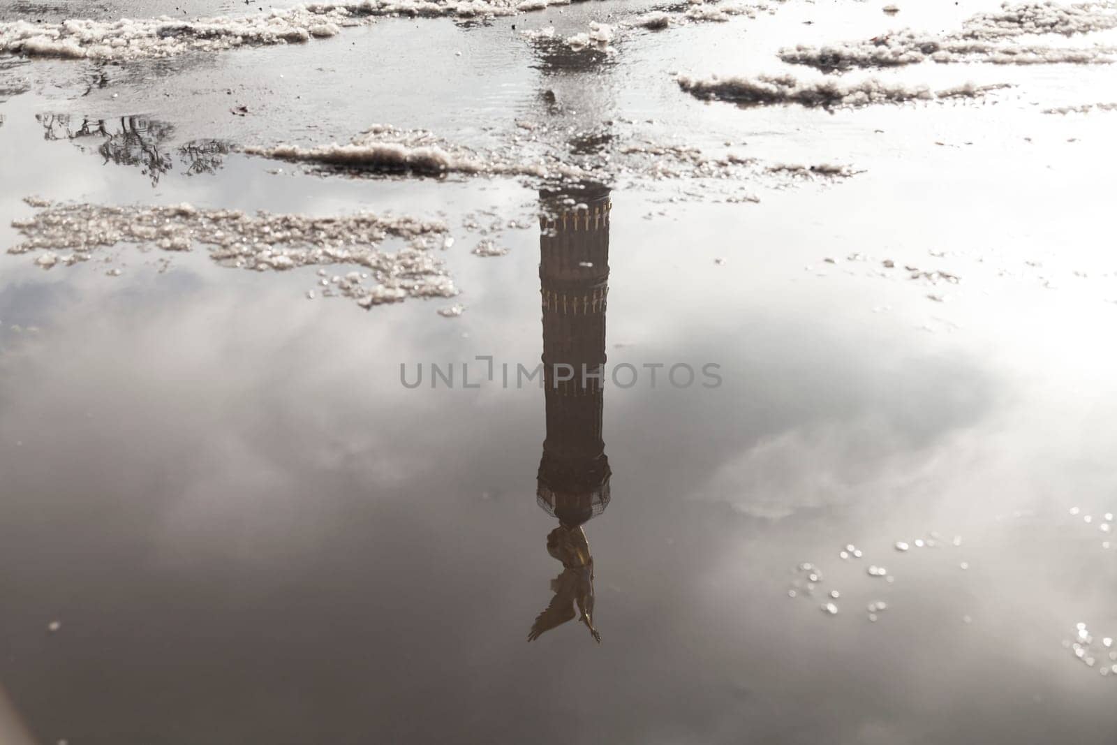Victory column in a water reflection