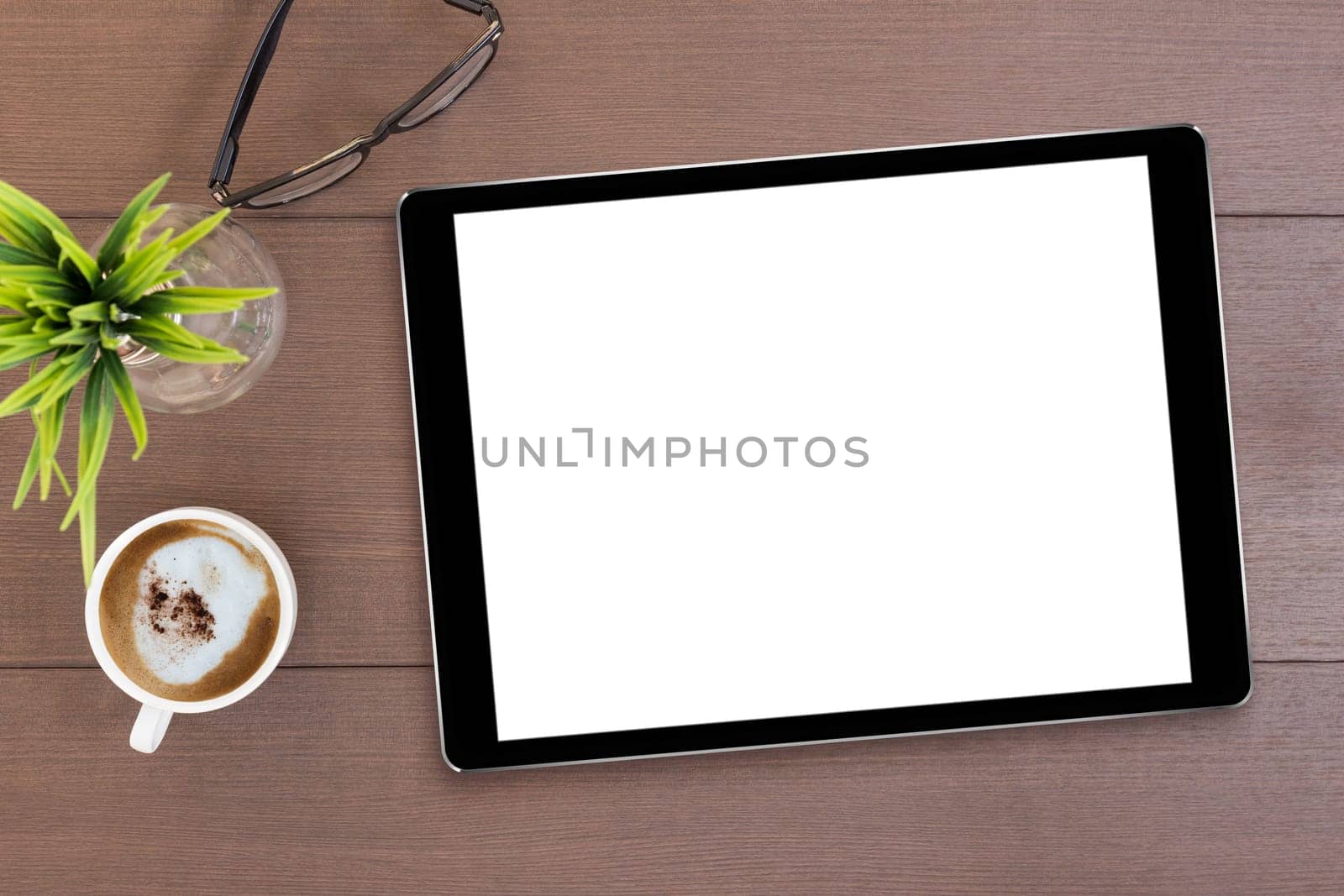 black tablet white screen on table top view