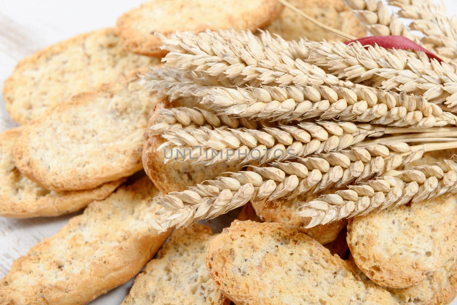 slices of toasted bread with ears of wheat