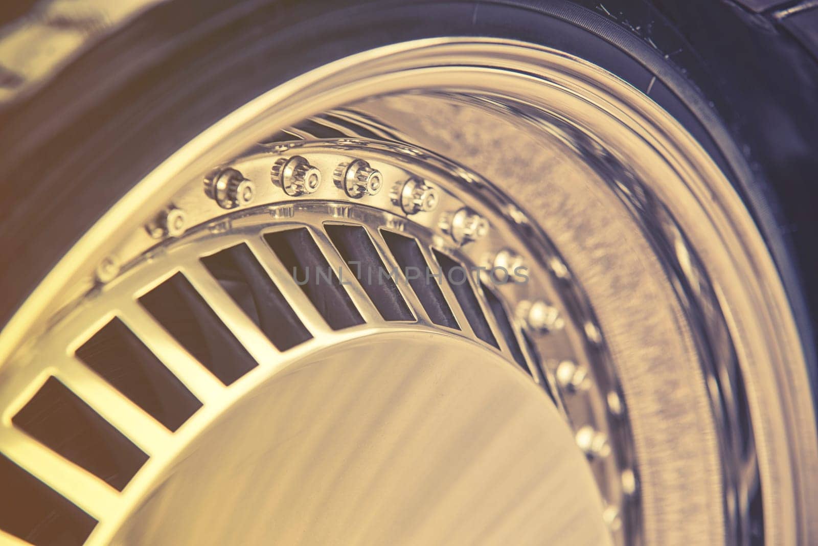 close-up of aluminum rim of luxury car wheel