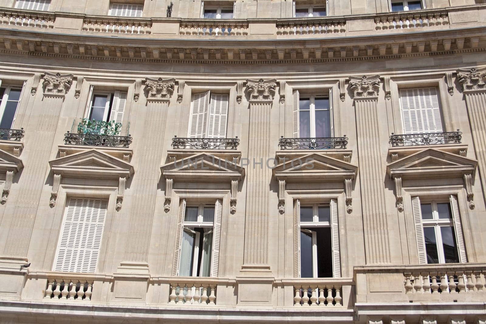 the old house with balconies and windows in Paris France