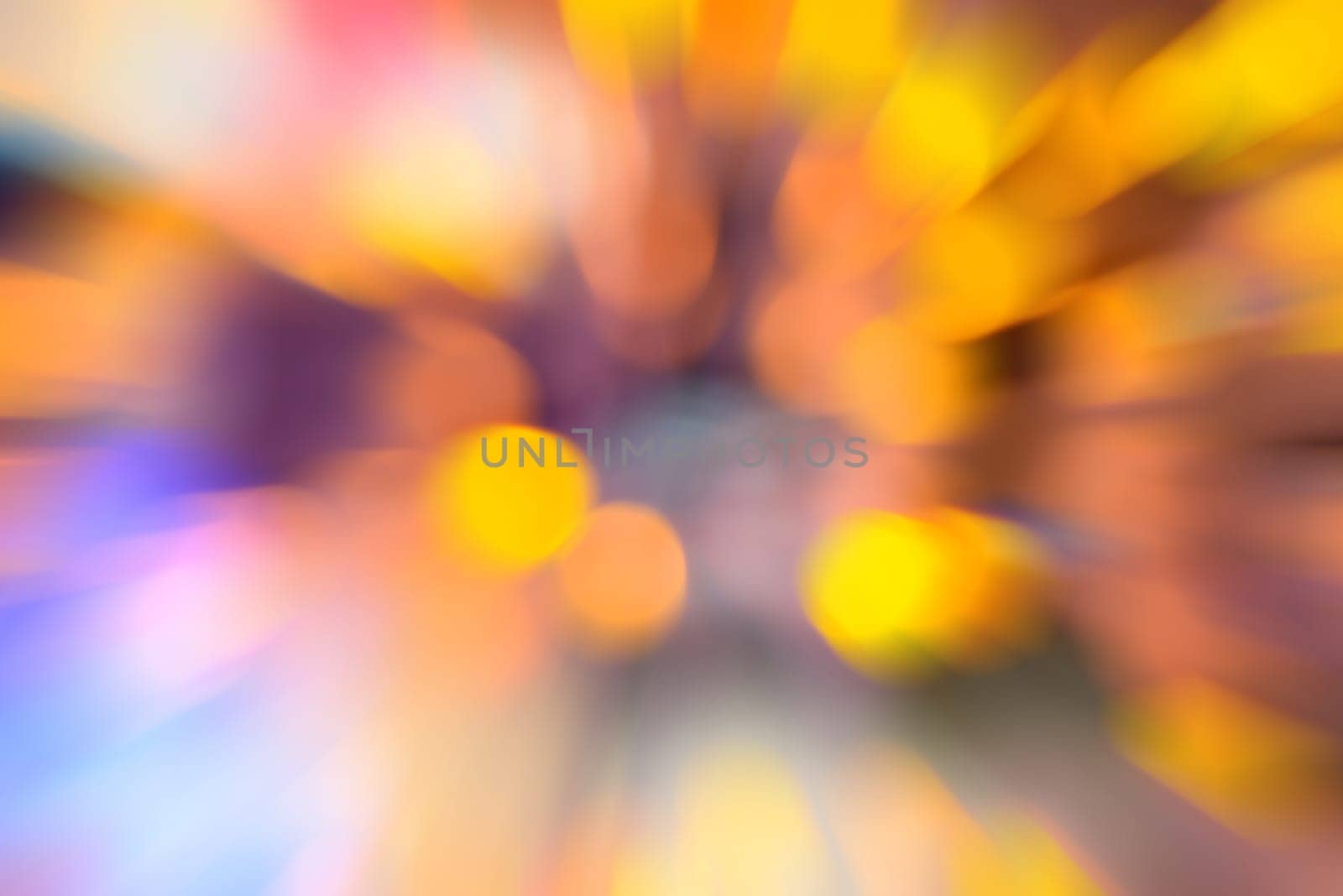Abstract circular natural orange and yellow light bokeh background, zoom effect