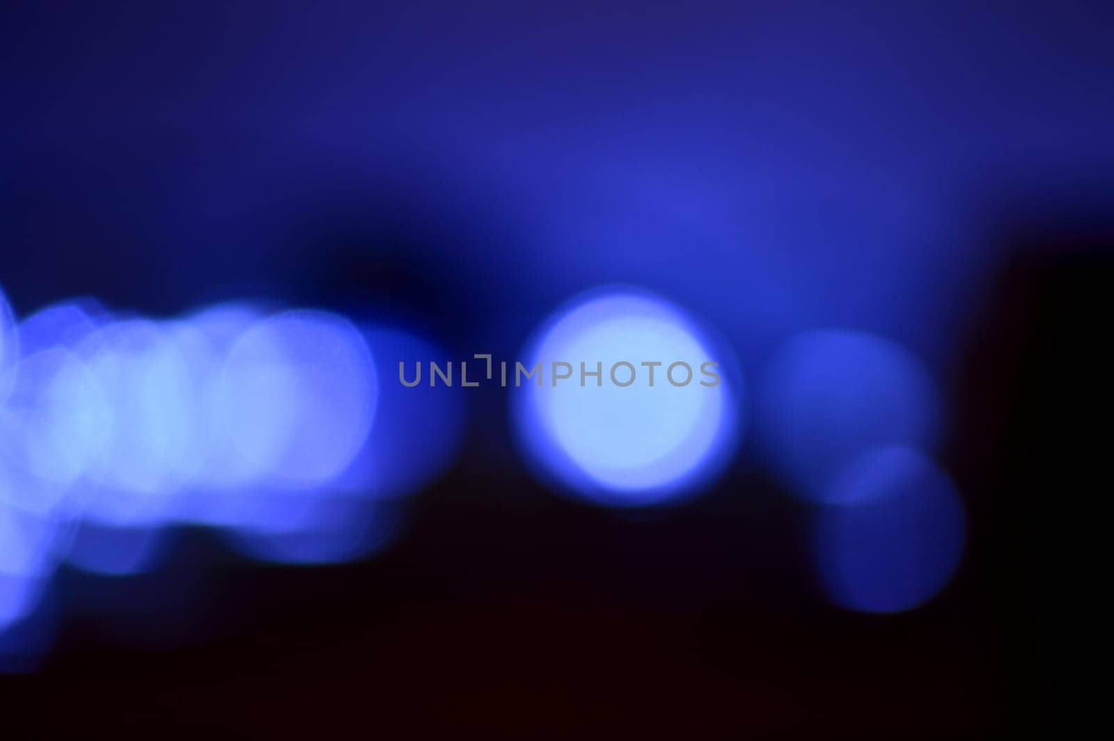 Modern bokeh bright lights in blue.