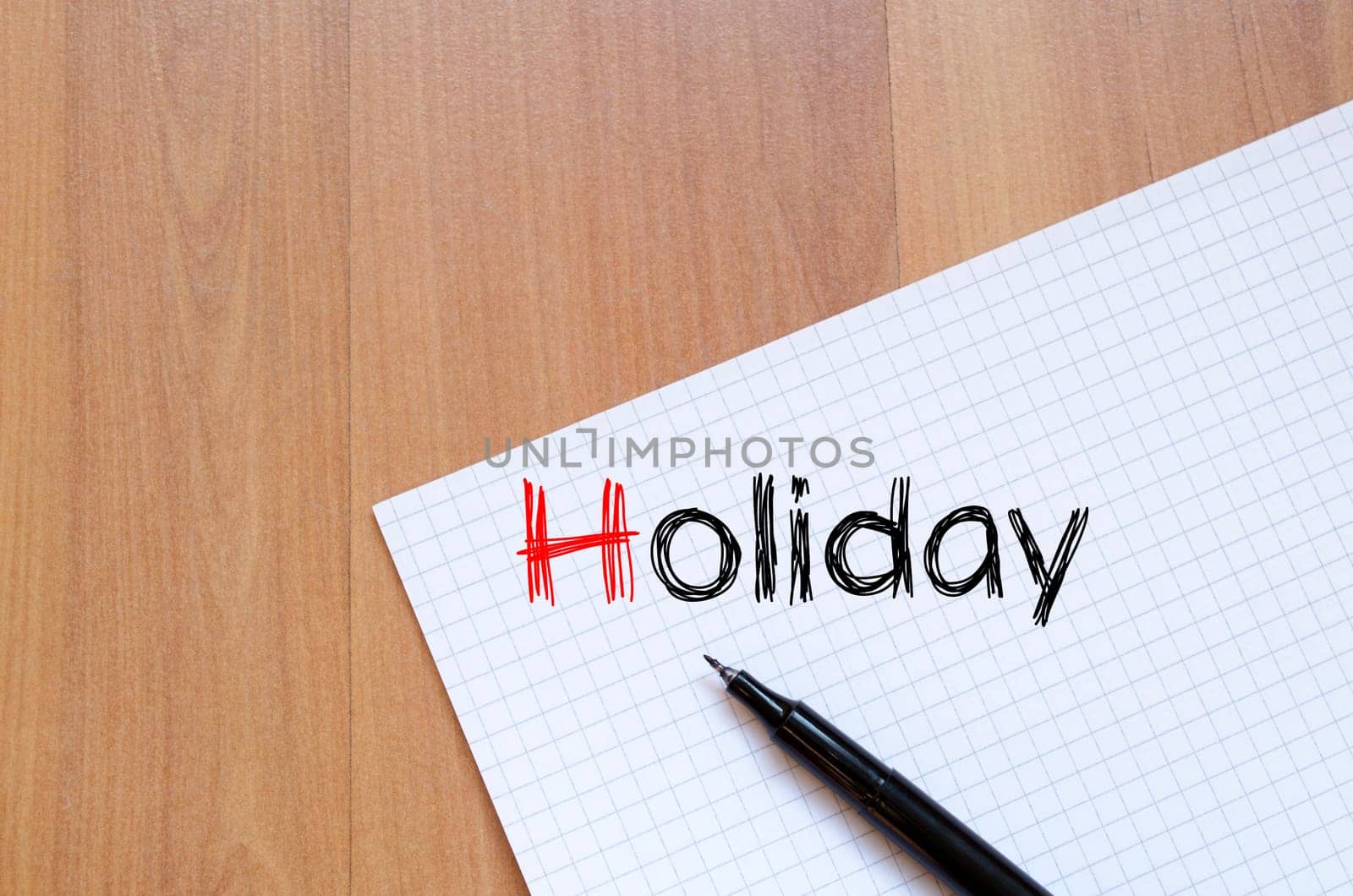 Holiday text concept write on notebook