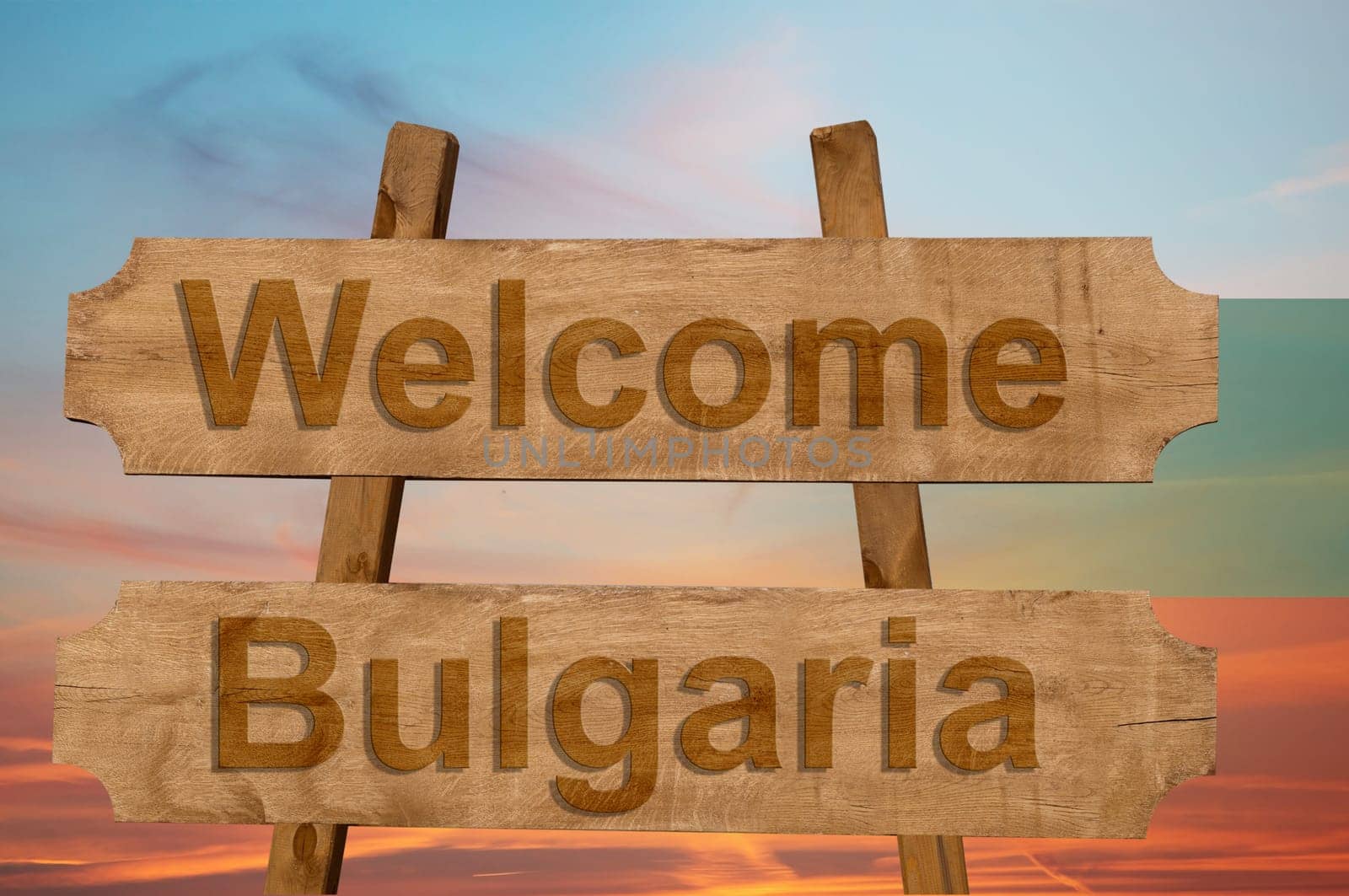 welcome to bulgaria sing on wood background with blending national flag