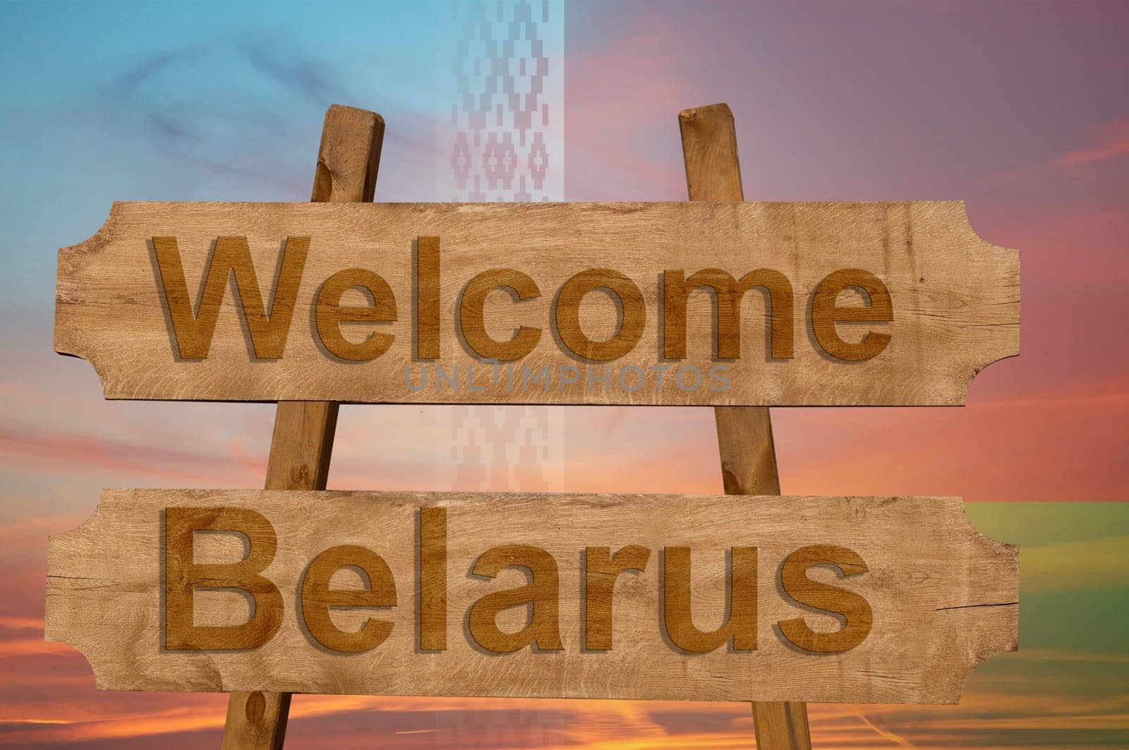 welcome to belarus sing on wood background with blending national flag