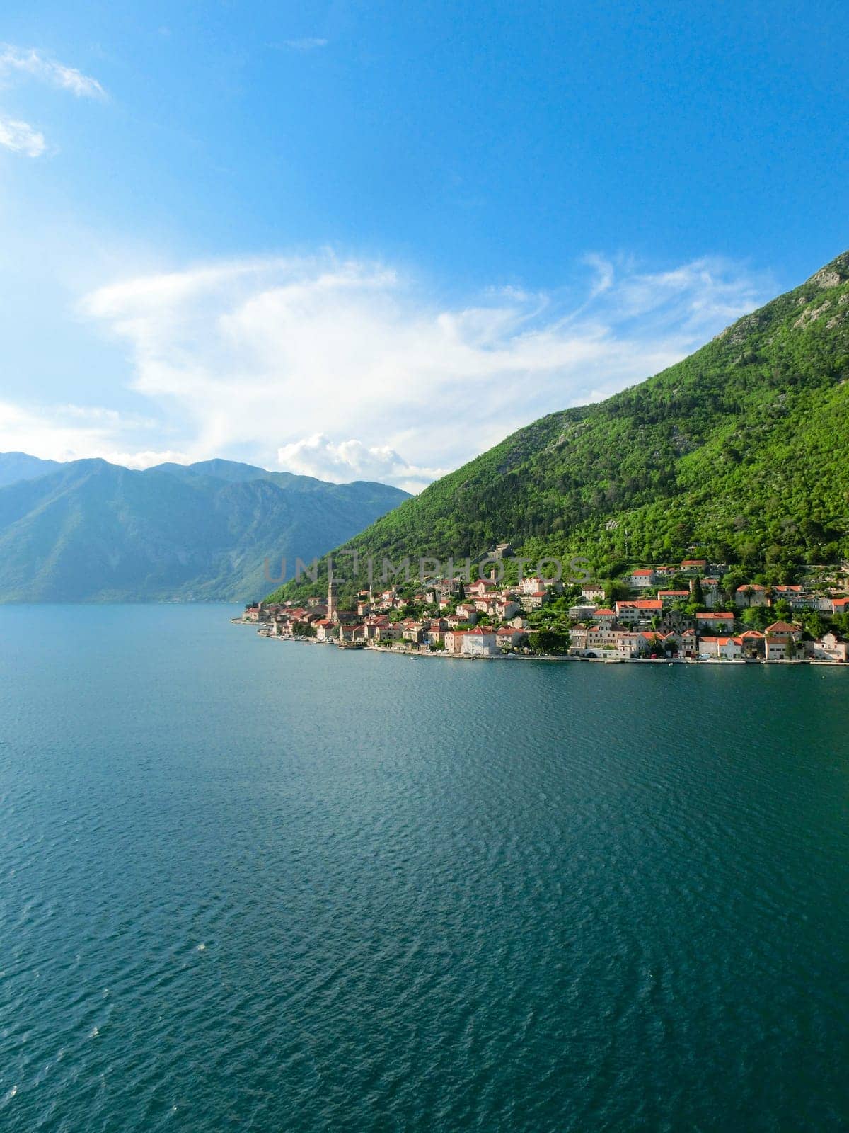 Village Perast on coast of Boka Kotor bay - Montenegro - nature and architecture background