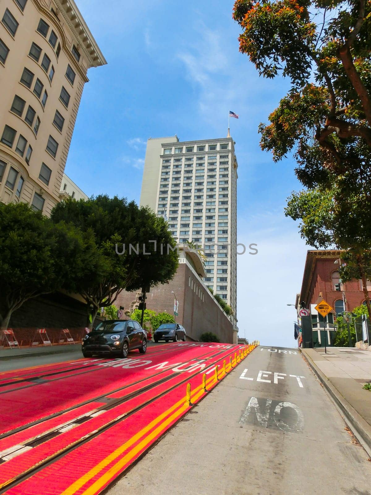 A typical San Francisco street with cable car tracks, California