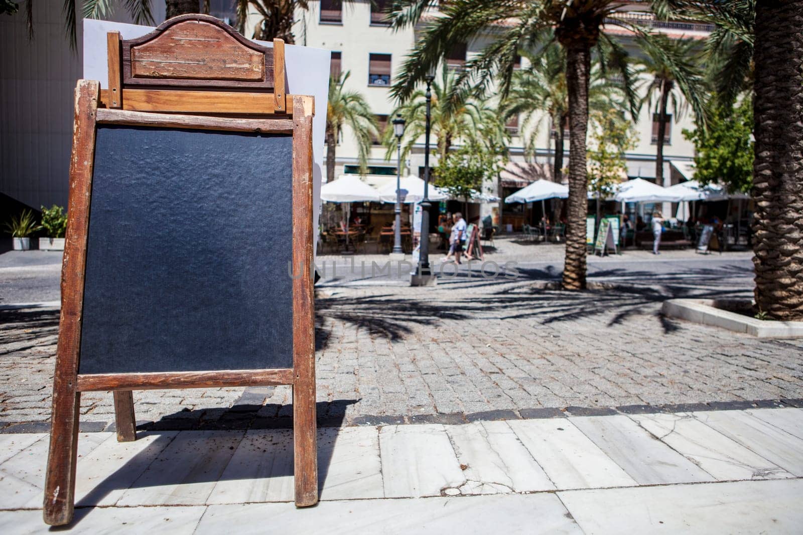 Empty tabloid offering food for terrace restaurants, Granada, Spain