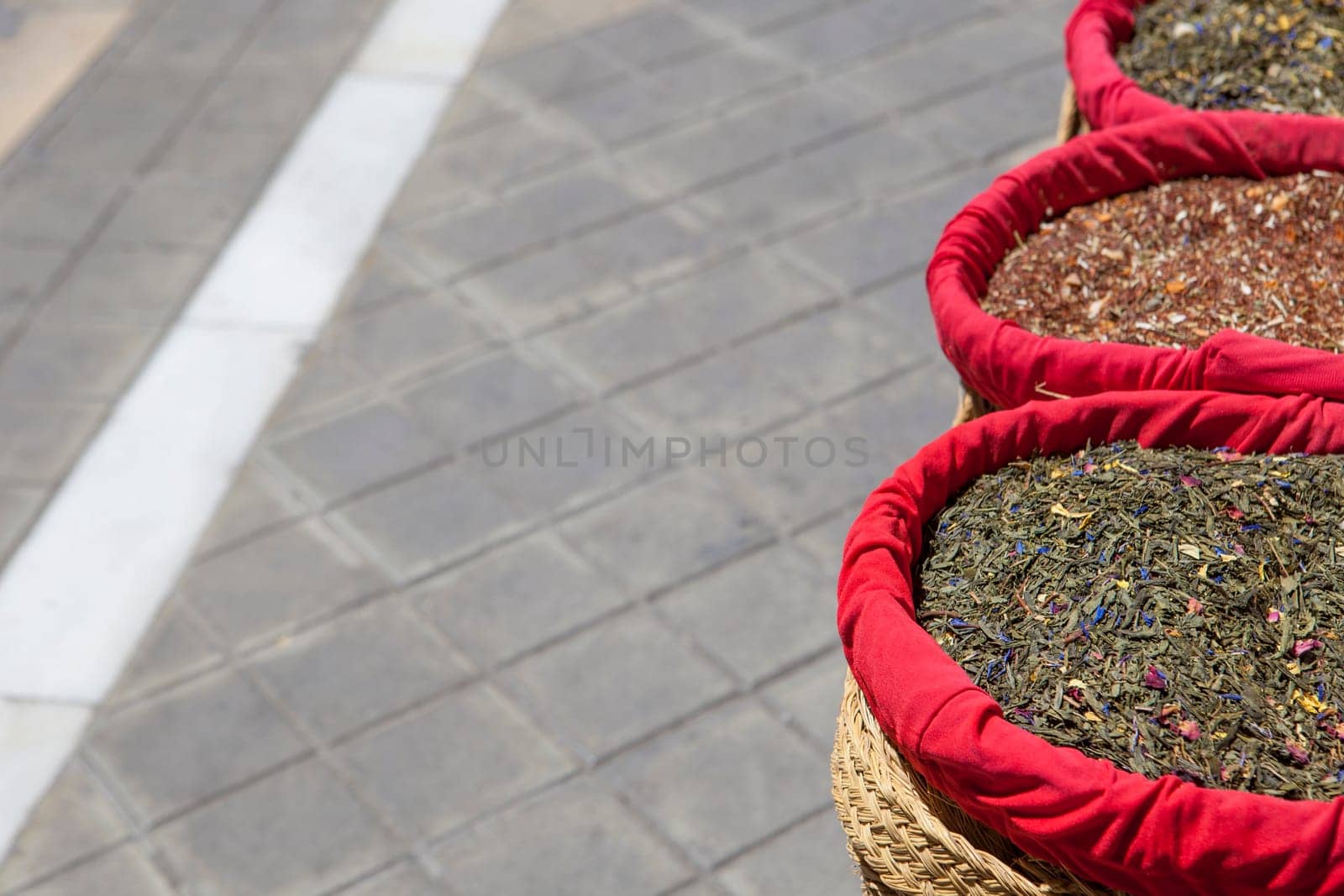 Spices, seeds and tea sold in a traditional street market