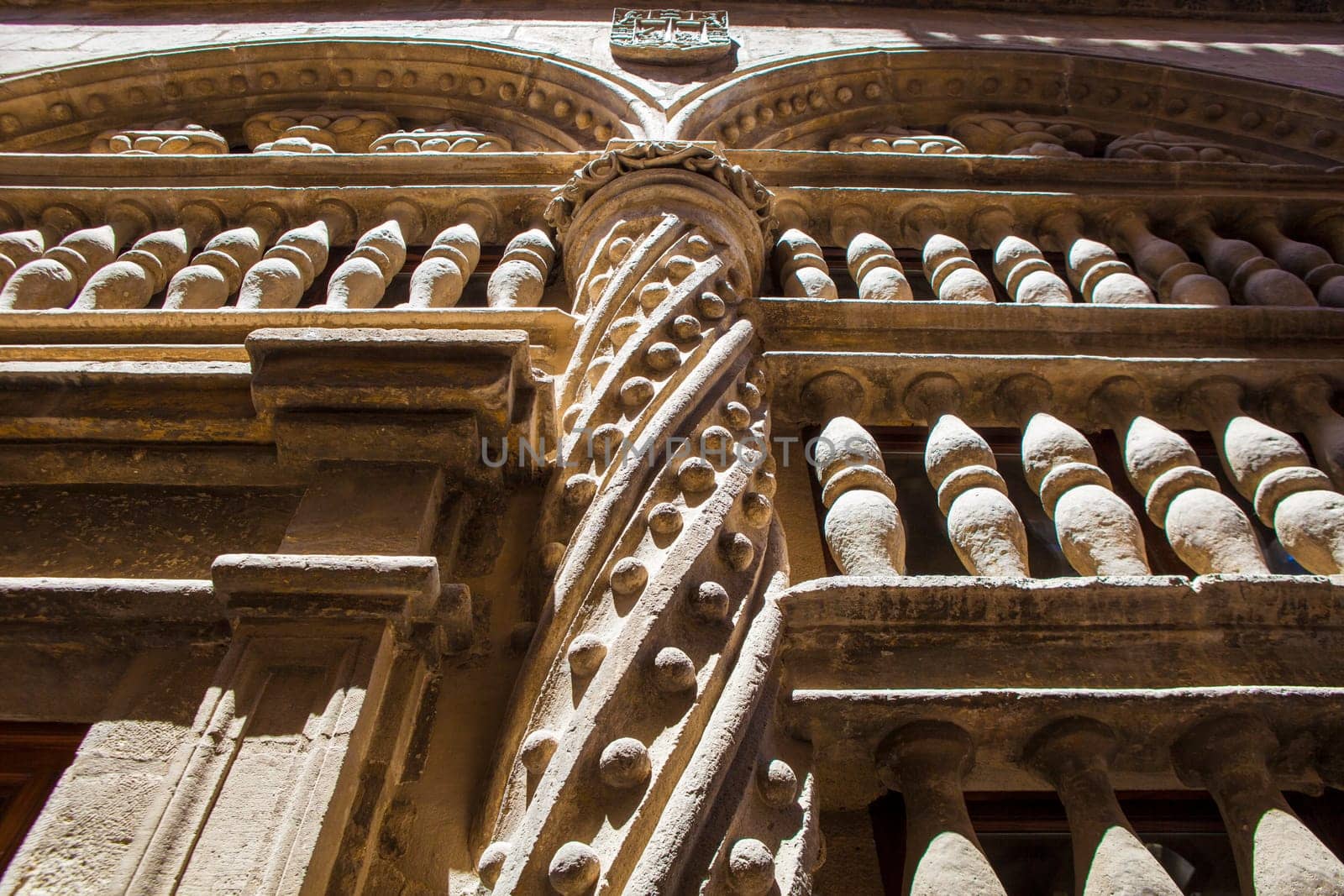 Baroque stone decoration beside the Royal Chapel outdoors at Granada Cathedral, Spain