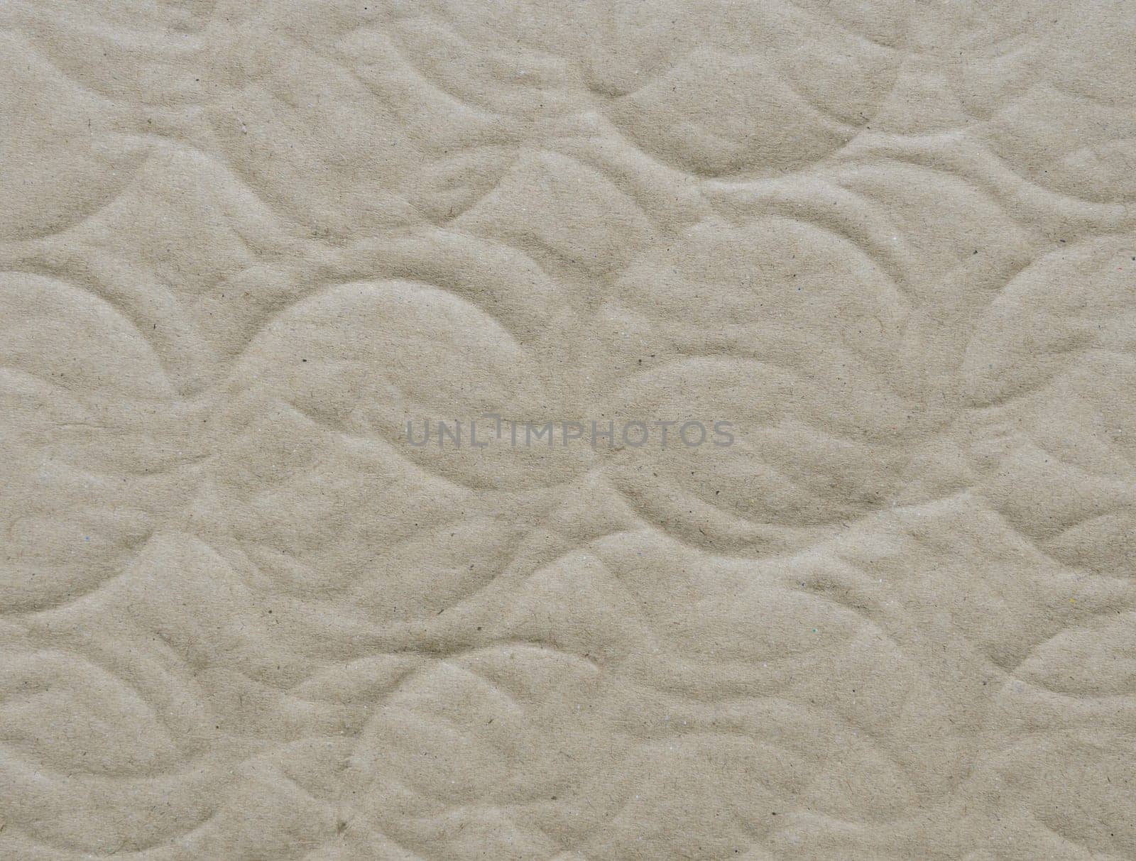 Recycled corrugated cardboard paper texture background with debossed circle shape