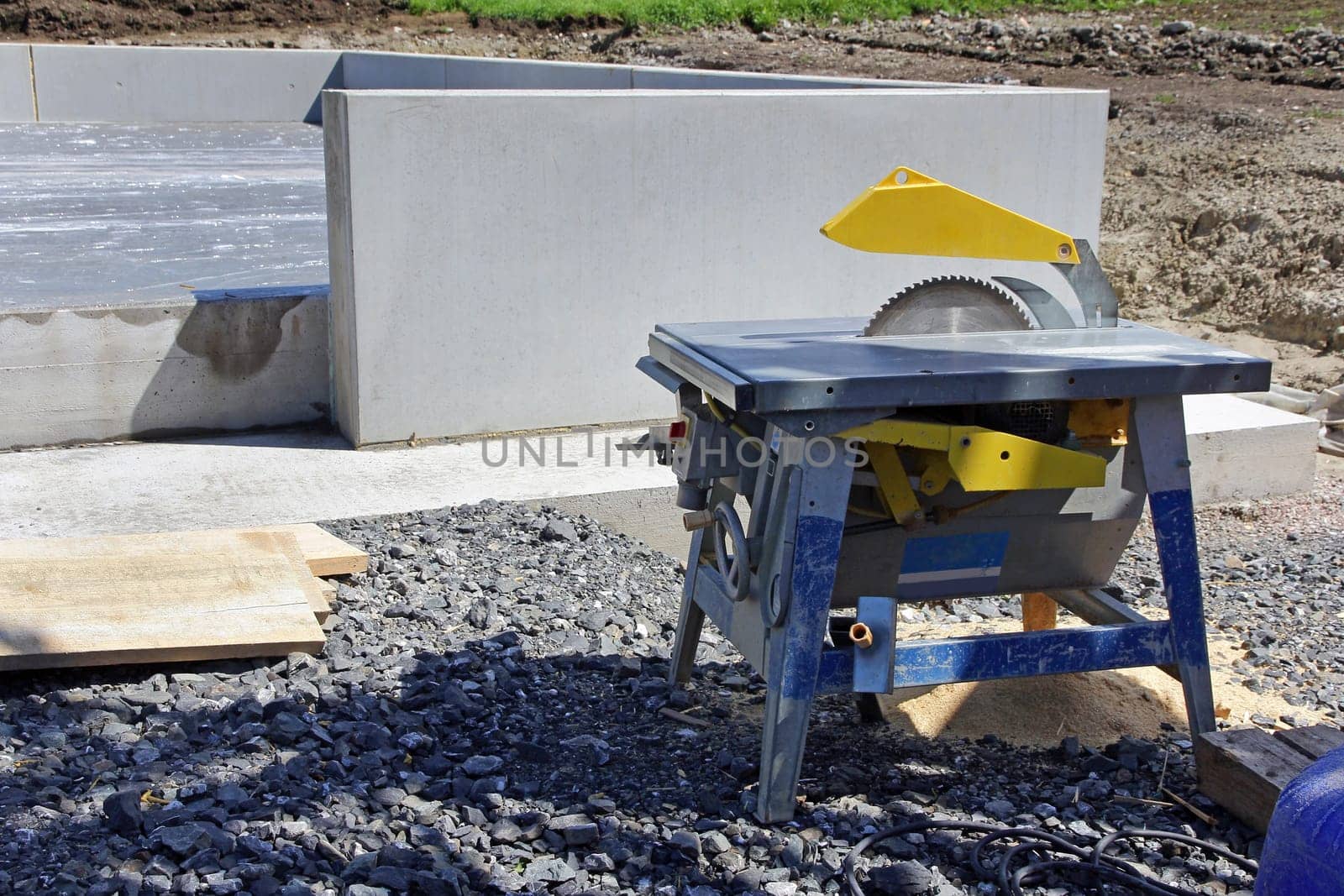 Circular table saw with saw blade at a construction site